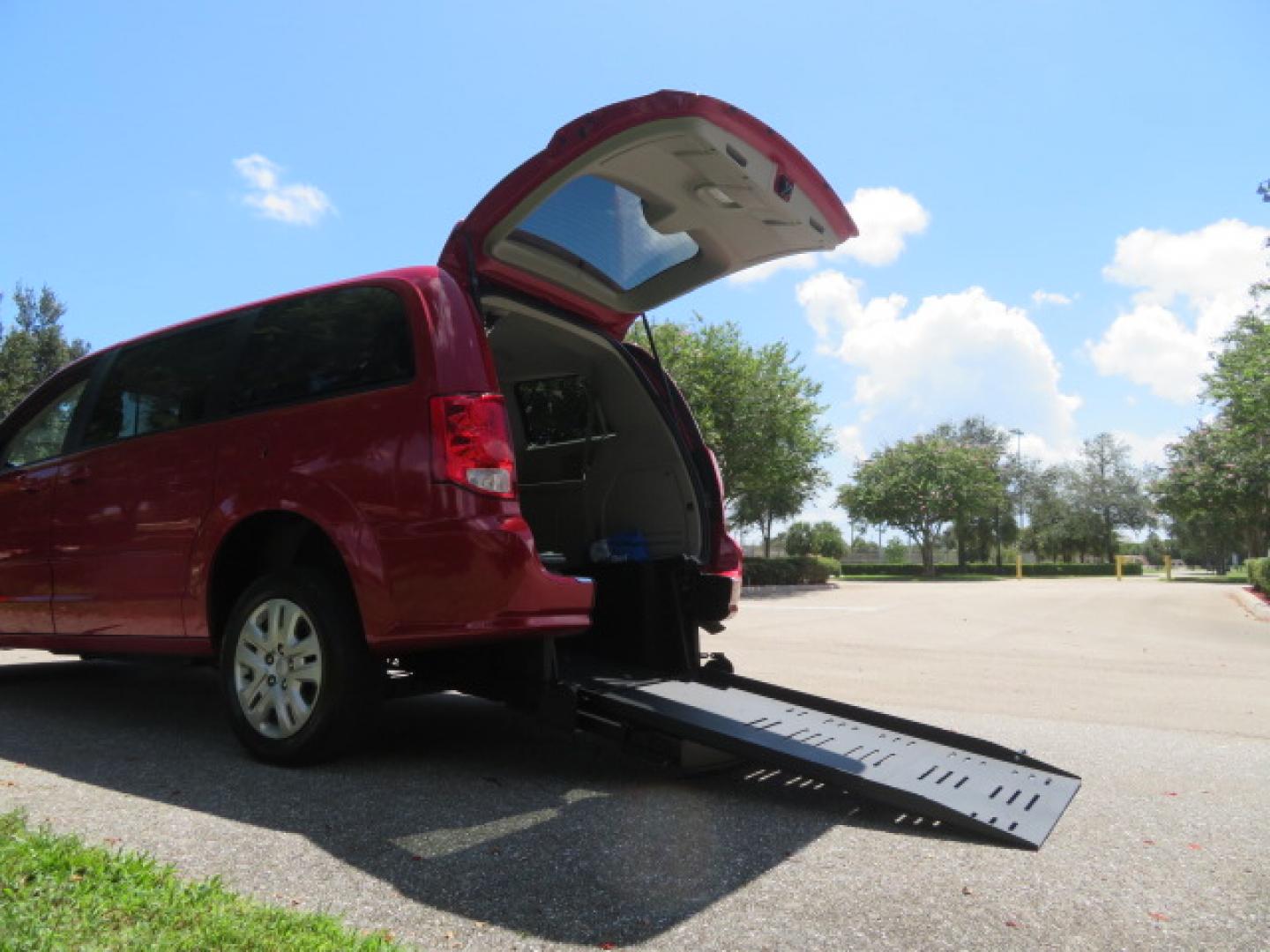 2015 Dodge Grand Caravan SE (2C4RDGBG4FR) with an 3.6L V6 DOHC 24V engine, 6-Speed Automatic transmission, located at 4301 Oak Circle #19, Boca Raton, FL, 33431, (954) 561-2499, 26.388861, -80.084038 - You are looking at a Gorgeous 2015 Dodge Grand Caravan SE Braunability Handicap Wheelchair Conversion Van with only 8100 Original Miles, Rear Entry Manual Ramp System, Rear Folding Seat Option, Rear Q Lock 150 Docking System, Full Power Package, Wheelchair Restraints, Rear Seat Belt Restraint, and M - Photo#46