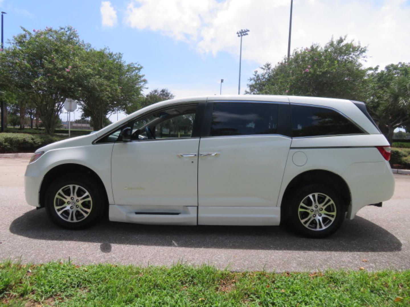 2012 /Tan Honda Odyssey EX (5FNRL5H41CB) with an 3.5L V6 SOHC 24V engine, 5-Speed Automatic transmission, located at 4301 Oak Circle #19, Boca Raton, FL, 33431, (954) 561-2499, 26.388861, -80.084038 - You are looking at a beautiful 2012 Honda Odyssey EX Braunability Handicap Wheelchair Conversion Van with Side Entry Braun Power Foldout Ramp System, Q Straint Tie Down System in the Floor, Hard Core Rubber Floor, Kneel Down System, Remote Keyless Entry with Remote Power Doors and Ramp System, 2 Key - Photo#8