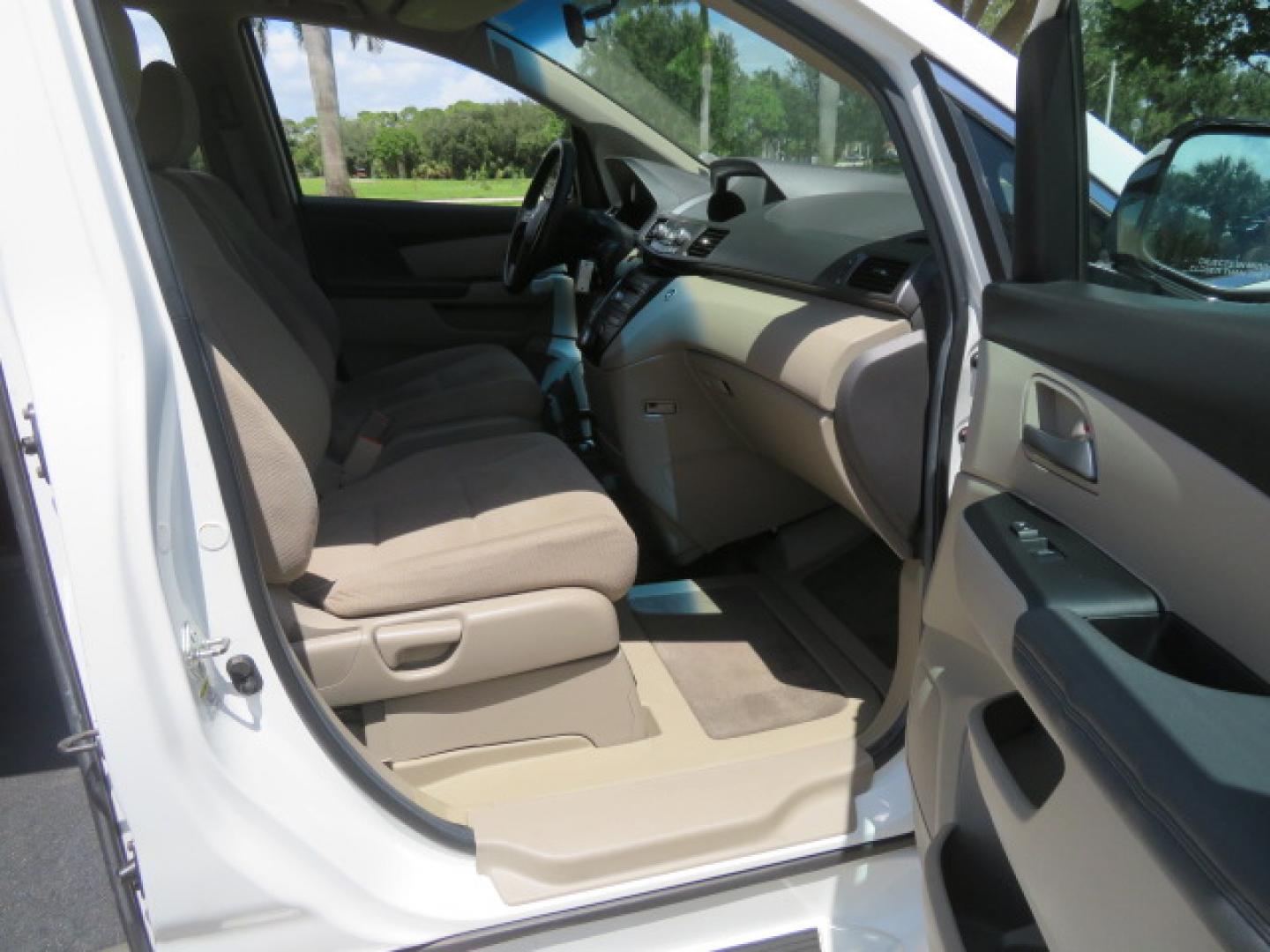 2012 /Tan Honda Odyssey EX (5FNRL5H41CB) with an 3.5L V6 SOHC 24V engine, 5-Speed Automatic transmission, located at 4301 Oak Circle #19, Boca Raton, FL, 33431, (954) 561-2499, 26.388861, -80.084038 - You are looking at a beautiful 2012 Honda Odyssey EX Braunability Handicap Wheelchair Conversion Van with Side Entry Braun Power Foldout Ramp System, Q Straint Tie Down System in the Floor, Hard Core Rubber Floor, Kneel Down System, Remote Keyless Entry with Remote Power Doors and Ramp System, 2 Key - Photo#69