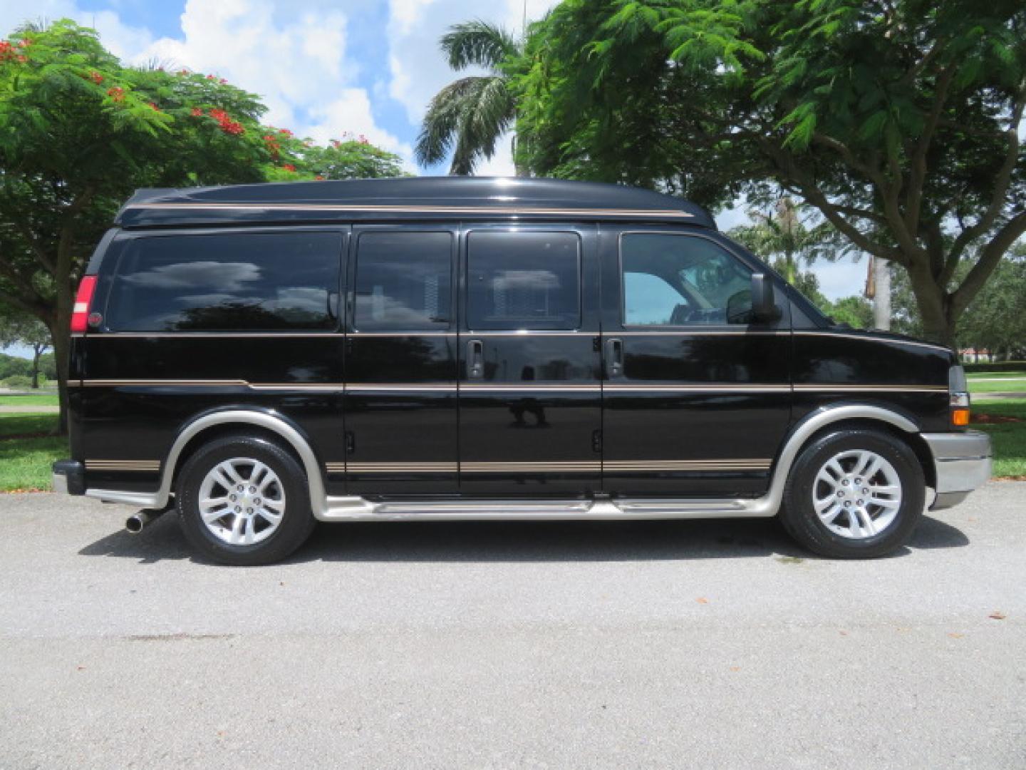 2014 /Beige Chevrolet Express G2500 3LT RV (1GBSGDC40E1) with an 5.3L V8 OHV 16V FFV engine, 6-Speed Automatic transmission, located at 4301 Oak Circle #19, Boca Raton, FL, 33431, (954) 561-2499, 26.388861, -80.084038 - You are looking at a Gorgeous 2014 Chevy Express High Top Handicap Wheelchair Conversion Van with Only 5100 Original Miles Fully Loaded with: 8 Door Package, American Luxury Conversion Package, Almost Brand New Side Entry Power Braunability Wheelchair Lift with 750LB Capacity, Leather, Rear Entertai - Photo#4