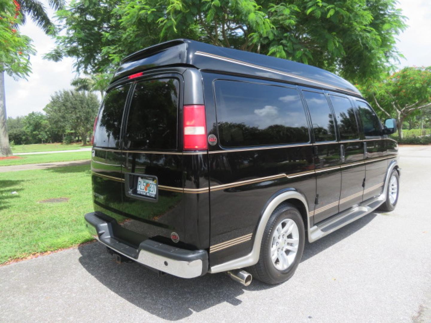 2014 /Beige Chevrolet Express G2500 3LT RV (1GBSGDC40E1) with an 5.3L V8 OHV 16V FFV engine, 6-Speed Automatic transmission, located at 4301 Oak Circle #19, Boca Raton, FL, 33431, (954) 561-2499, 26.388861, -80.084038 - You are looking at a Gorgeous 2014 Chevy Express High Top Handicap Wheelchair Conversion Van with Only 5100 Original Miles Fully Loaded with: 8 Door Package, American Luxury Conversion Package, Almost Brand New Side Entry Power Braunability Wheelchair Lift with 750LB Capacity, Leather, Rear Entertai - Photo#12