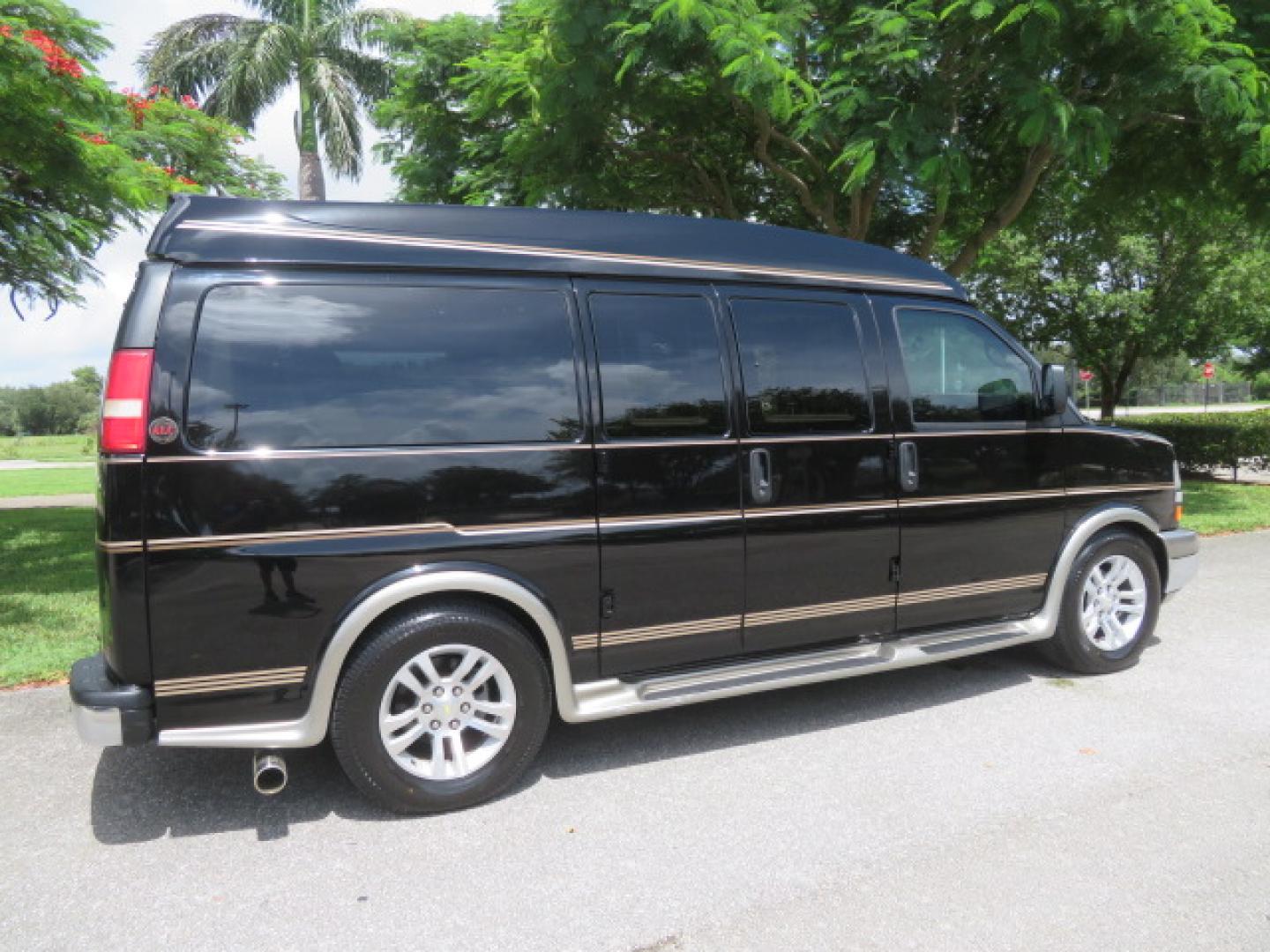 2014 /Beige Chevrolet Express G2500 3LT RV (1GBSGDC40E1) with an 5.3L V8 OHV 16V FFV engine, 6-Speed Automatic transmission, located at 4301 Oak Circle #19, Boca Raton, FL, 33431, (954) 561-2499, 26.388861, -80.084038 - You are looking at a Gorgeous 2014 Chevy Express High Top Handicap Wheelchair Conversion Van with Only 5100 Original Miles Fully Loaded with: 8 Door Package, American Luxury Conversion Package, Almost Brand New Side Entry Power Braunability Wheelchair Lift with 750LB Capacity, Leather, Rear Entertai - Photo#13