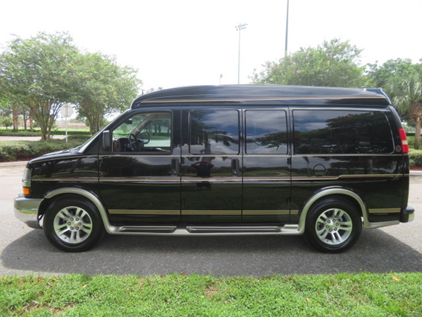 2014 /Beige Chevrolet Express G2500 3LT RV (1GBSGDC40E1) with an 5.3L V8 OHV 16V FFV engine, 6-Speed Automatic transmission, located at 4301 Oak Circle #19, Boca Raton, FL, 33431, (954) 561-2499, 26.388861, -80.084038 - You are looking at a Gorgeous 2014 Chevy Express High Top Handicap Wheelchair Conversion Van with Only 5100 Original Miles Fully Loaded with: 8 Door Package, American Luxury Conversion Package, Almost Brand New Side Entry Power Braunability Wheelchair Lift with 750LB Capacity, Leather, Rear Entertai - Photo#18