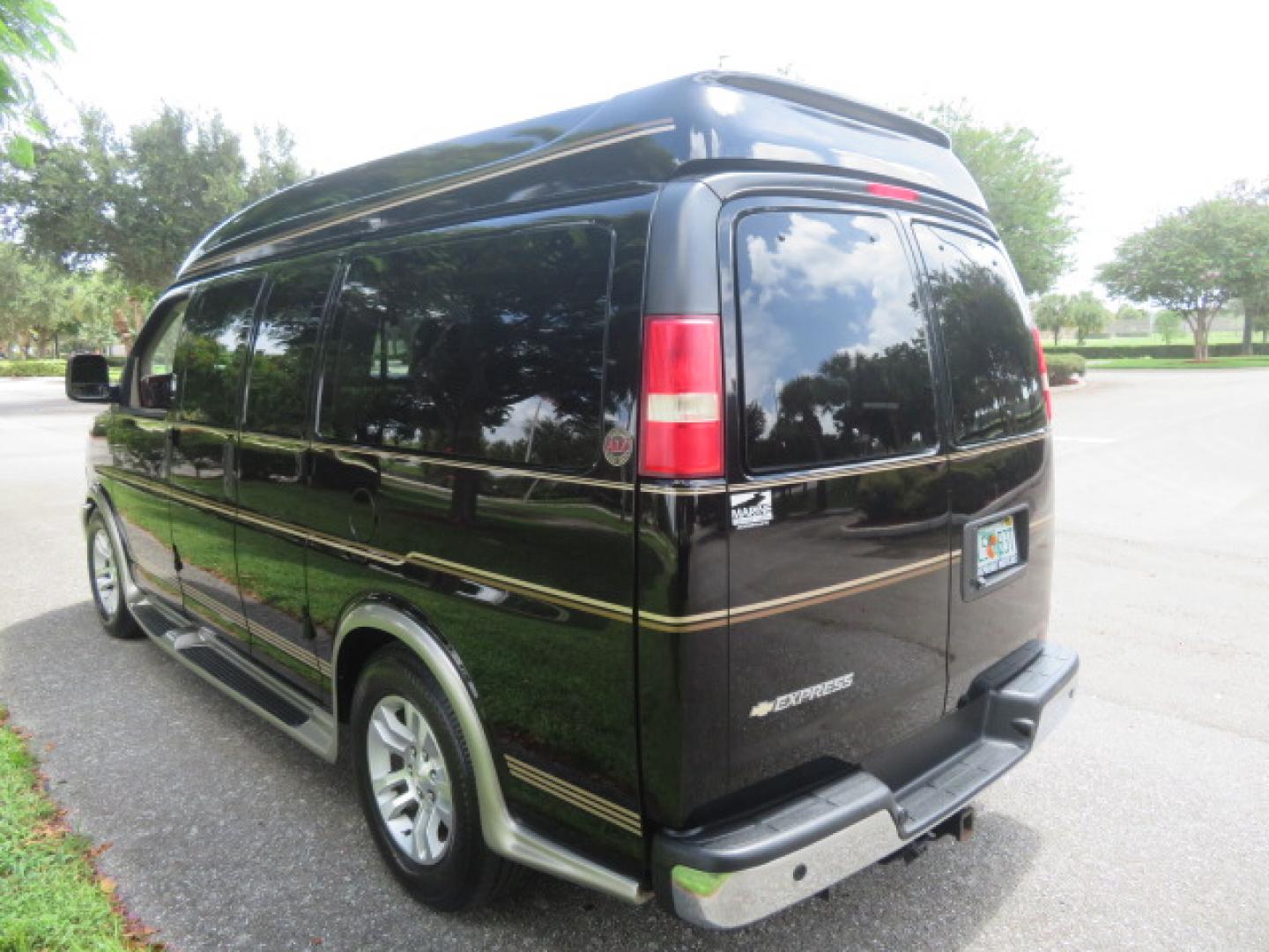 2014 /Beige Chevrolet Express G2500 3LT RV (1GBSGDC40E1) with an 5.3L V8 OHV 16V FFV engine, 6-Speed Automatic transmission, located at 4301 Oak Circle #19, Boca Raton, FL, 33431, (954) 561-2499, 26.388861, -80.084038 - You are looking at a Gorgeous 2014 Chevy Express High Top Handicap Wheelchair Conversion Van with Only 5100 Original Miles Fully Loaded with: 8 Door Package, American Luxury Conversion Package, Almost Brand New Side Entry Power Braunability Wheelchair Lift with 750LB Capacity, Leather, Rear Entertai - Photo#19