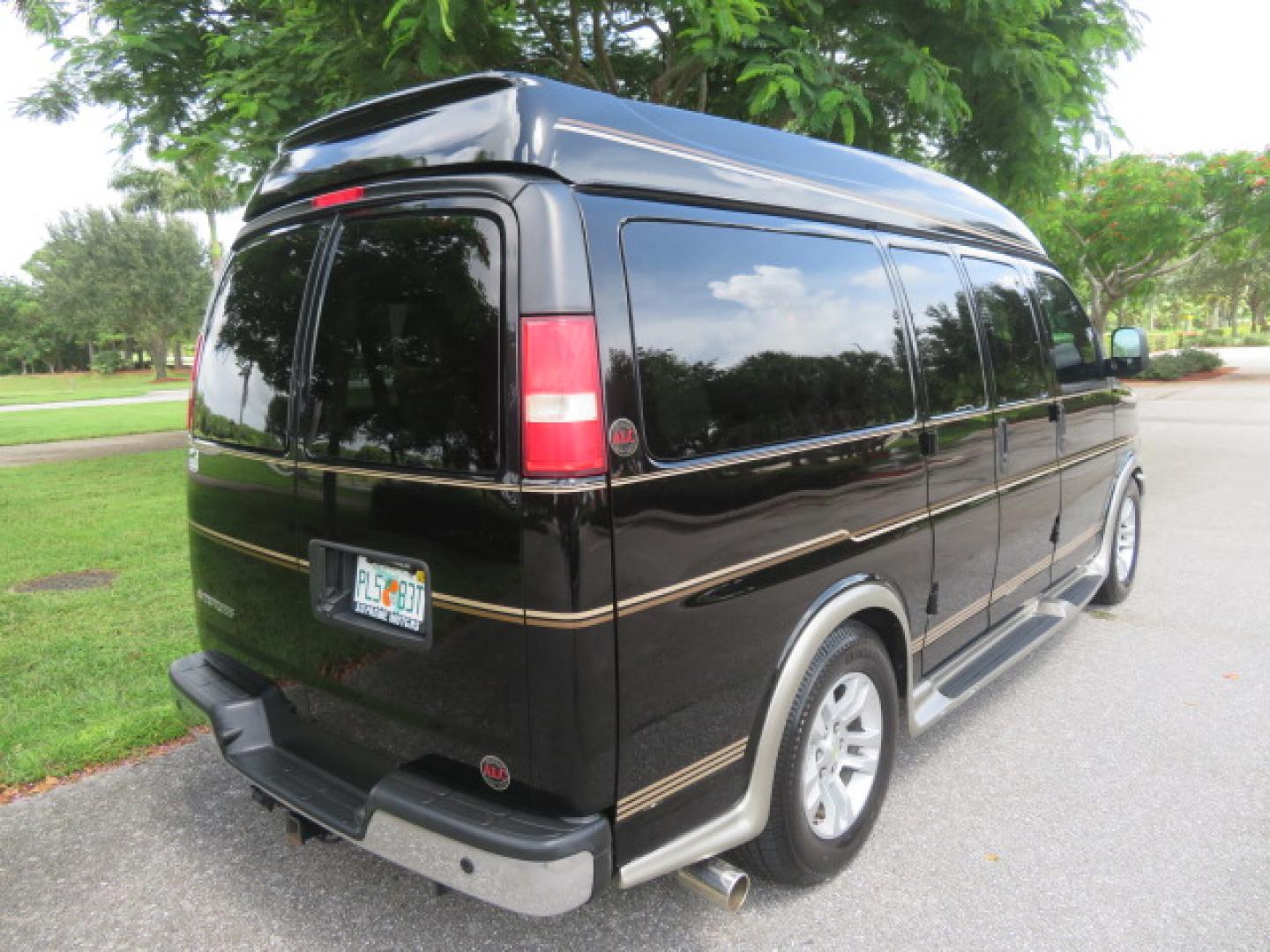 2014 /Beige Chevrolet Express G2500 3LT RV (1GBSGDC40E1) with an 5.3L V8 OHV 16V FFV engine, 6-Speed Automatic transmission, located at 4301 Oak Circle #19, Boca Raton, FL, 33431, (954) 561-2499, 26.388861, -80.084038 - You are looking at a Gorgeous 2014 Chevy Express High Top Handicap Wheelchair Conversion Van with Only 5100 Original Miles Fully Loaded with: 8 Door Package, American Luxury Conversion Package, Almost Brand New Side Entry Power Braunability Wheelchair Lift with 750LB Capacity, Leather, Rear Entertai - Photo#21