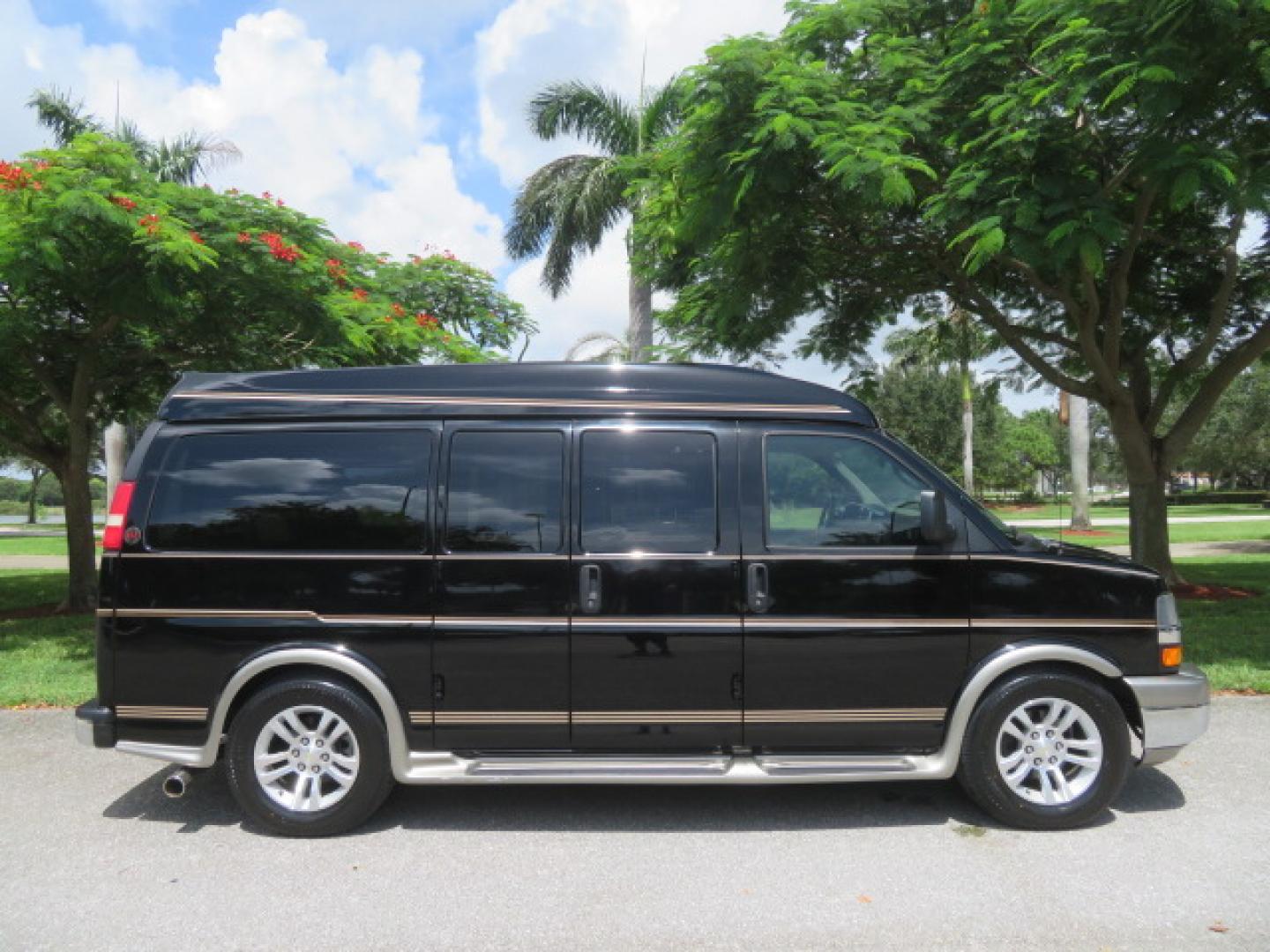 2014 /Beige Chevrolet Express G2500 3LT RV (1GBSGDC40E1) with an 5.3L V8 OHV 16V FFV engine, 6-Speed Automatic transmission, located at 4301 Oak Circle #19, Boca Raton, FL, 33431, (954) 561-2499, 26.388861, -80.084038 - You are looking at a Gorgeous 2014 Chevy Express High Top Handicap Wheelchair Conversion Van with Only 5100 Original Miles Fully Loaded with: 8 Door Package, American Luxury Conversion Package, Almost Brand New Side Entry Power Braunability Wheelchair Lift with 750LB Capacity, Leather, Rear Entertai - Photo#3