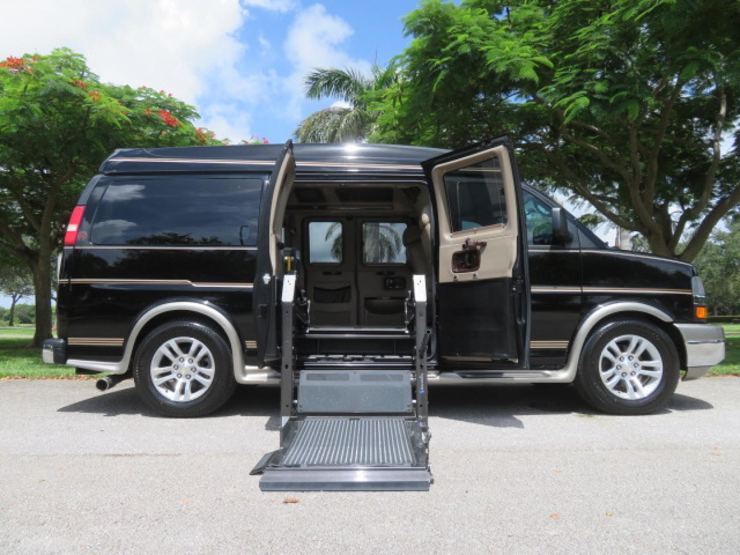 2014 /Beige Chevrolet Express G2500 3LT RV (1GBSGDC40E1) with an 5.3L V8 OHV 16V FFV engine, 6-Speed Automatic transmission, located at 4301 Oak Circle #19, Boca Raton, FL, 33431, (954) 561-2499, 26.388861, -80.084038 - You are looking at a Gorgeous 2014 Chevy Express High Top Handicap Wheelchair Conversion Van with Only 5100 Original Miles Fully Loaded with: 8 Door Package, American Luxury Conversion Package, Almost Brand New Side Entry Power Braunability Wheelchair Lift with 750LB Capacity, Leather, Rear Entertai - Photo#34