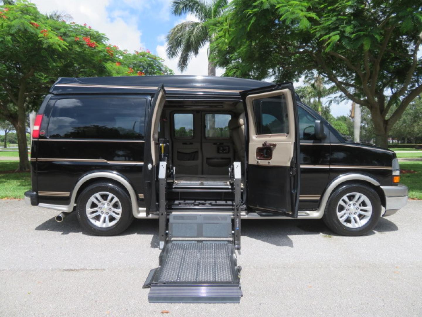 2014 /Beige Chevrolet Express G2500 3LT RV (1GBSGDC40E1) with an 5.3L V8 OHV 16V FFV engine, 6-Speed Automatic transmission, located at 4301 Oak Circle #19, Boca Raton, FL, 33431, (954) 561-2499, 26.388861, -80.084038 - You are looking at a Gorgeous 2014 Chevy Express High Top Handicap Wheelchair Conversion Van with Only 5100 Original Miles Fully Loaded with: 8 Door Package, American Luxury Conversion Package, Almost Brand New Side Entry Power Braunability Wheelchair Lift with 750LB Capacity, Leather, Rear Entertai - Photo#1