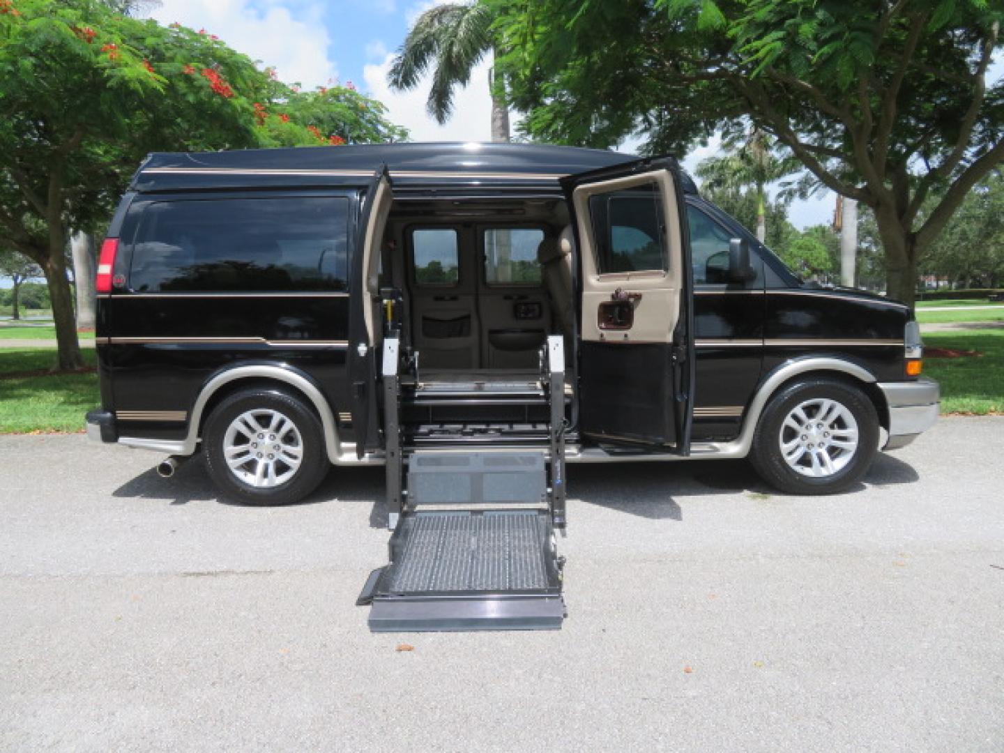 2014 /Beige Chevrolet Express G2500 3LT RV (1GBSGDC40E1) with an 5.3L V8 OHV 16V FFV engine, 6-Speed Automatic transmission, located at 4301 Oak Circle #19, Boca Raton, FL, 33431, (954) 561-2499, 26.388861, -80.084038 - You are looking at a Gorgeous 2014 Chevy Express High Top Handicap Wheelchair Conversion Van with Only 5100 Original Miles Fully Loaded with: 8 Door Package, American Luxury Conversion Package, Almost Brand New Side Entry Power Braunability Wheelchair Lift with 750LB Capacity, Leather, Rear Entertai - Photo#35