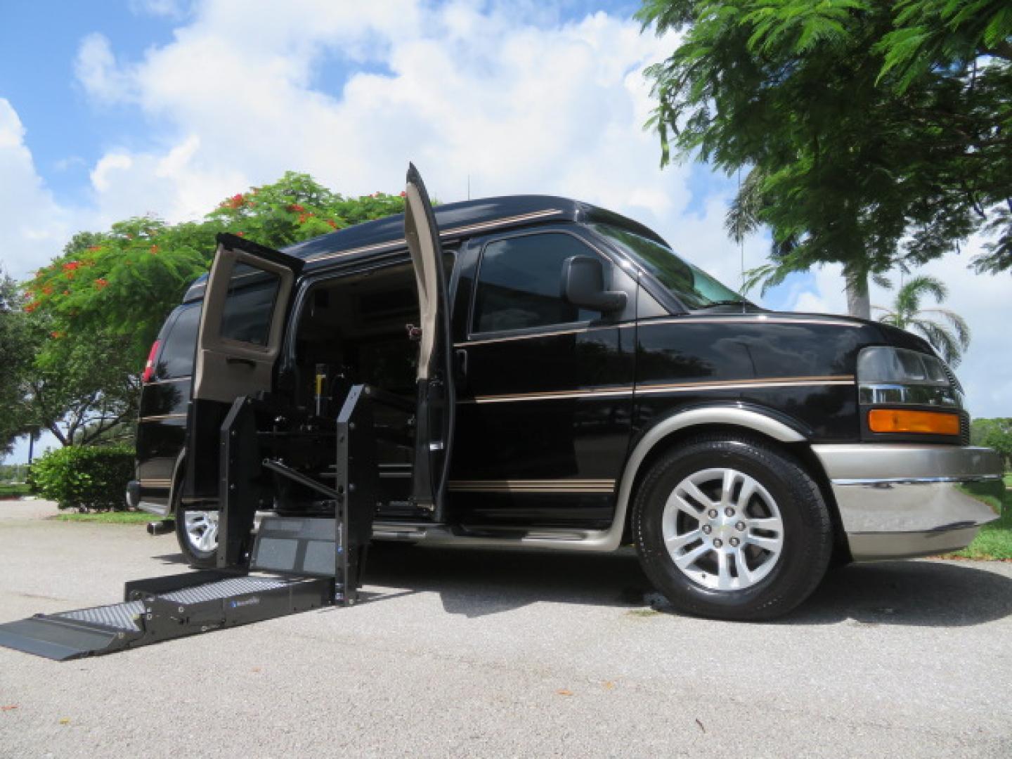 2014 /Beige Chevrolet Express G2500 3LT RV (1GBSGDC40E1) with an 5.3L V8 OHV 16V FFV engine, 6-Speed Automatic transmission, located at 4301 Oak Circle #19, Boca Raton, FL, 33431, (954) 561-2499, 26.388861, -80.084038 - You are looking at a Gorgeous 2014 Chevy Express High Top Handicap Wheelchair Conversion Van with Only 5100 Original Miles Fully Loaded with: 8 Door Package, American Luxury Conversion Package, Almost Brand New Side Entry Power Braunability Wheelchair Lift with 750LB Capacity, Leather, Rear Entertai - Photo#0