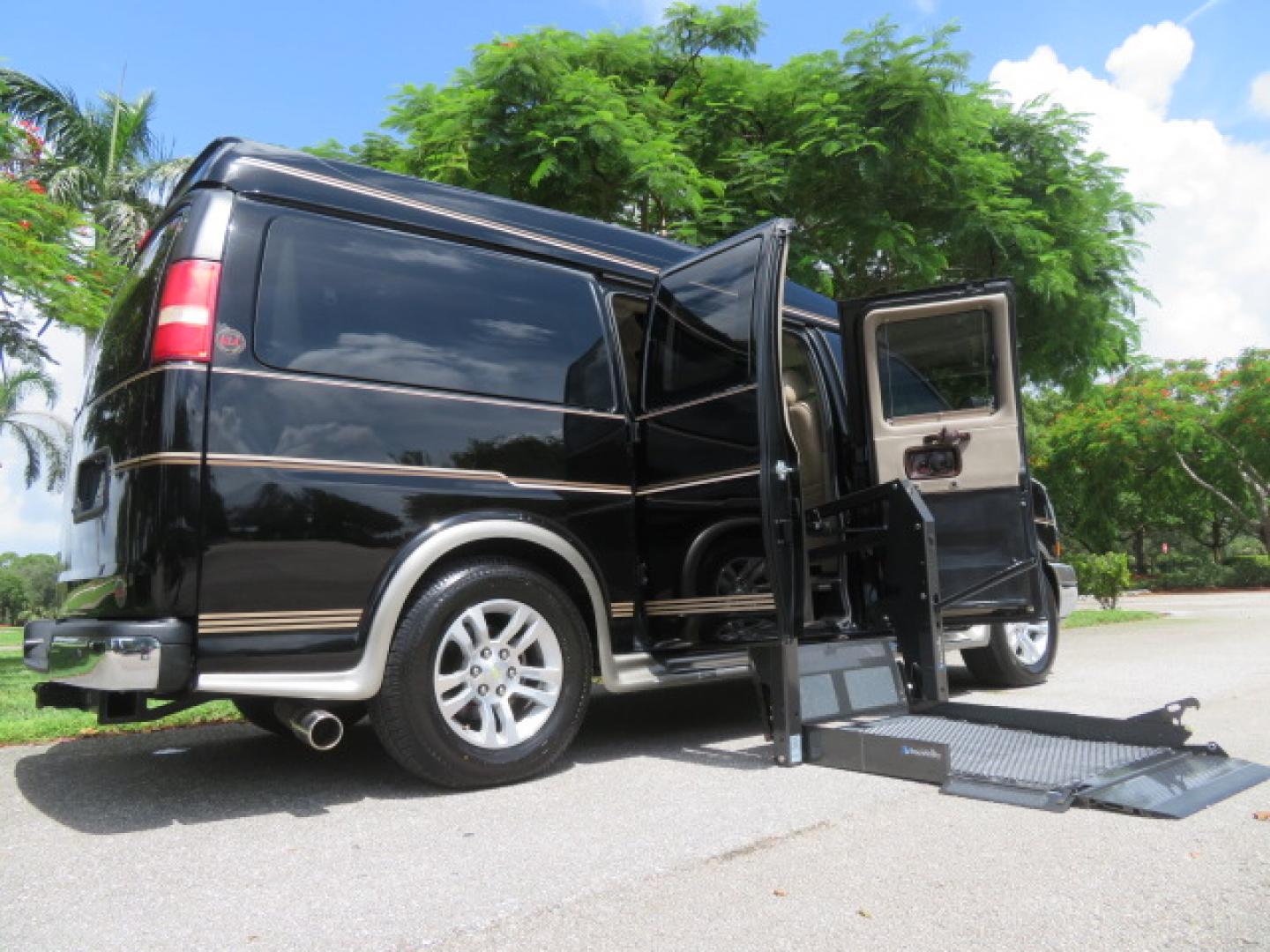 2014 /Beige Chevrolet Express G2500 3LT RV (1GBSGDC40E1) with an 5.3L V8 OHV 16V FFV engine, 6-Speed Automatic transmission, located at 4301 Oak Circle #19, Boca Raton, FL, 33431, (954) 561-2499, 26.388861, -80.084038 - You are looking at a Gorgeous 2014 Chevy Express High Top Handicap Wheelchair Conversion Van with Only 5100 Original Miles Fully Loaded with: 8 Door Package, American Luxury Conversion Package, Almost Brand New Side Entry Power Braunability Wheelchair Lift with 750LB Capacity, Leather, Rear Entertai - Photo#38