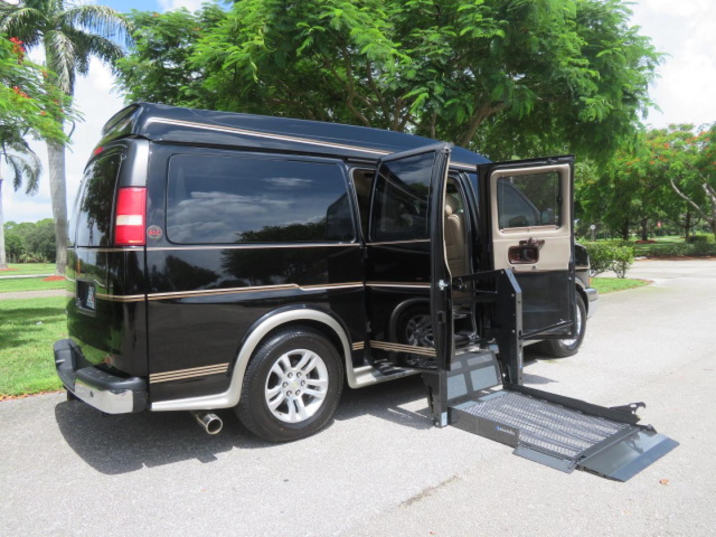 2014 /Beige Chevrolet Express G2500 3LT RV (1GBSGDC40E1) with an 5.3L V8 OHV 16V FFV engine, 6-Speed Automatic transmission, located at 4301 Oak Circle #19, Boca Raton, FL, 33431, (954) 561-2499, 26.388861, -80.084038 - You are looking at a Gorgeous 2014 Chevy Express High Top Handicap Wheelchair Conversion Van with Only 5100 Original Miles Fully Loaded with: 8 Door Package, American Luxury Conversion Package, Almost Brand New Side Entry Power Braunability Wheelchair Lift with 750LB Capacity, Leather, Rear Entertai - Photo#40