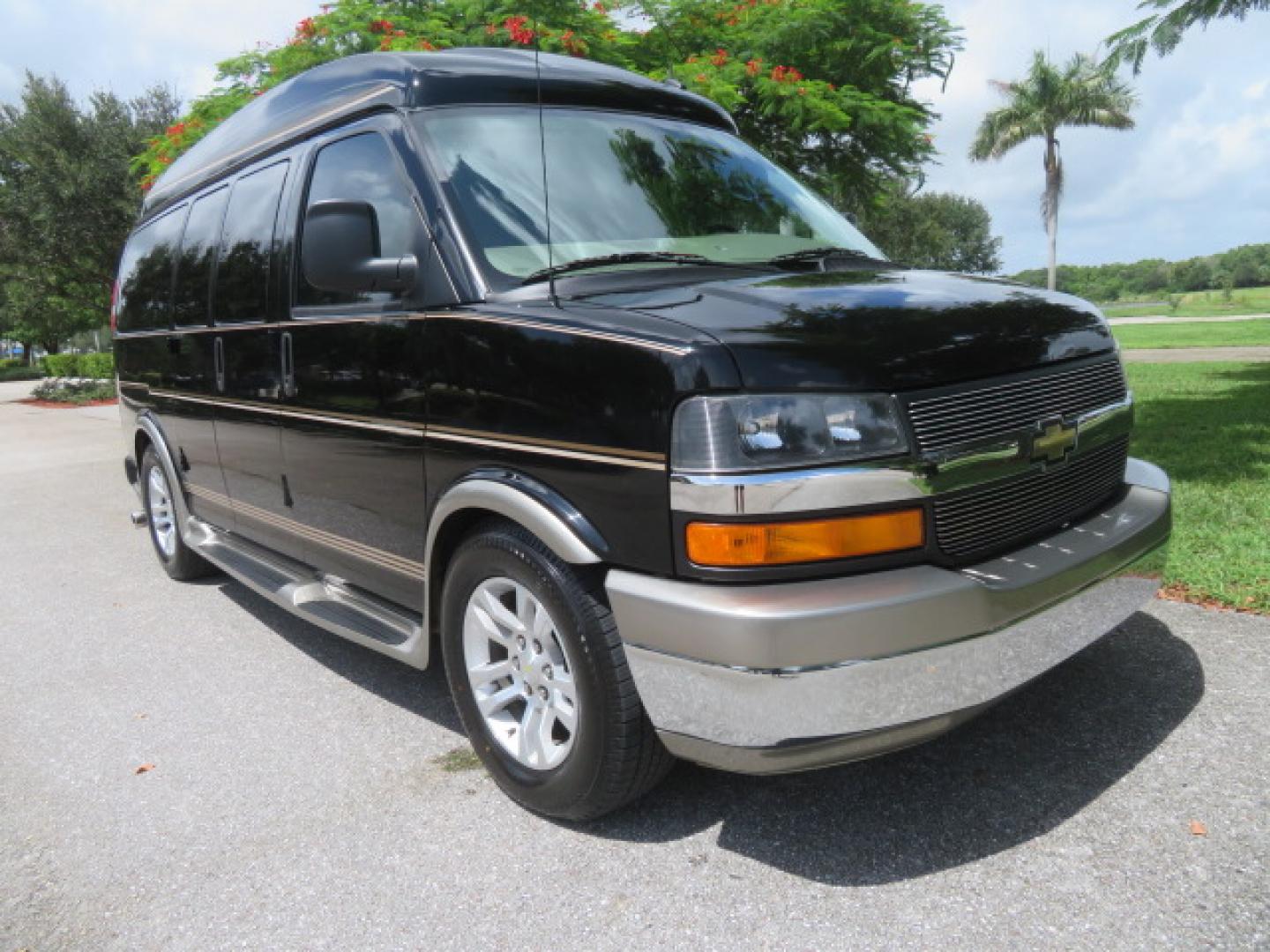 2014 /Beige Chevrolet Express G2500 3LT RV (1GBSGDC40E1) with an 5.3L V8 OHV 16V FFV engine, 6-Speed Automatic transmission, located at 4301 Oak Circle #19, Boca Raton, FL, 33431, (954) 561-2499, 26.388861, -80.084038 - You are looking at a Gorgeous 2014 Chevy Express High Top Handicap Wheelchair Conversion Van with Only 5100 Original Miles Fully Loaded with: 8 Door Package, American Luxury Conversion Package, Almost Brand New Side Entry Power Braunability Wheelchair Lift with 750LB Capacity, Leather, Rear Entertai - Photo#6