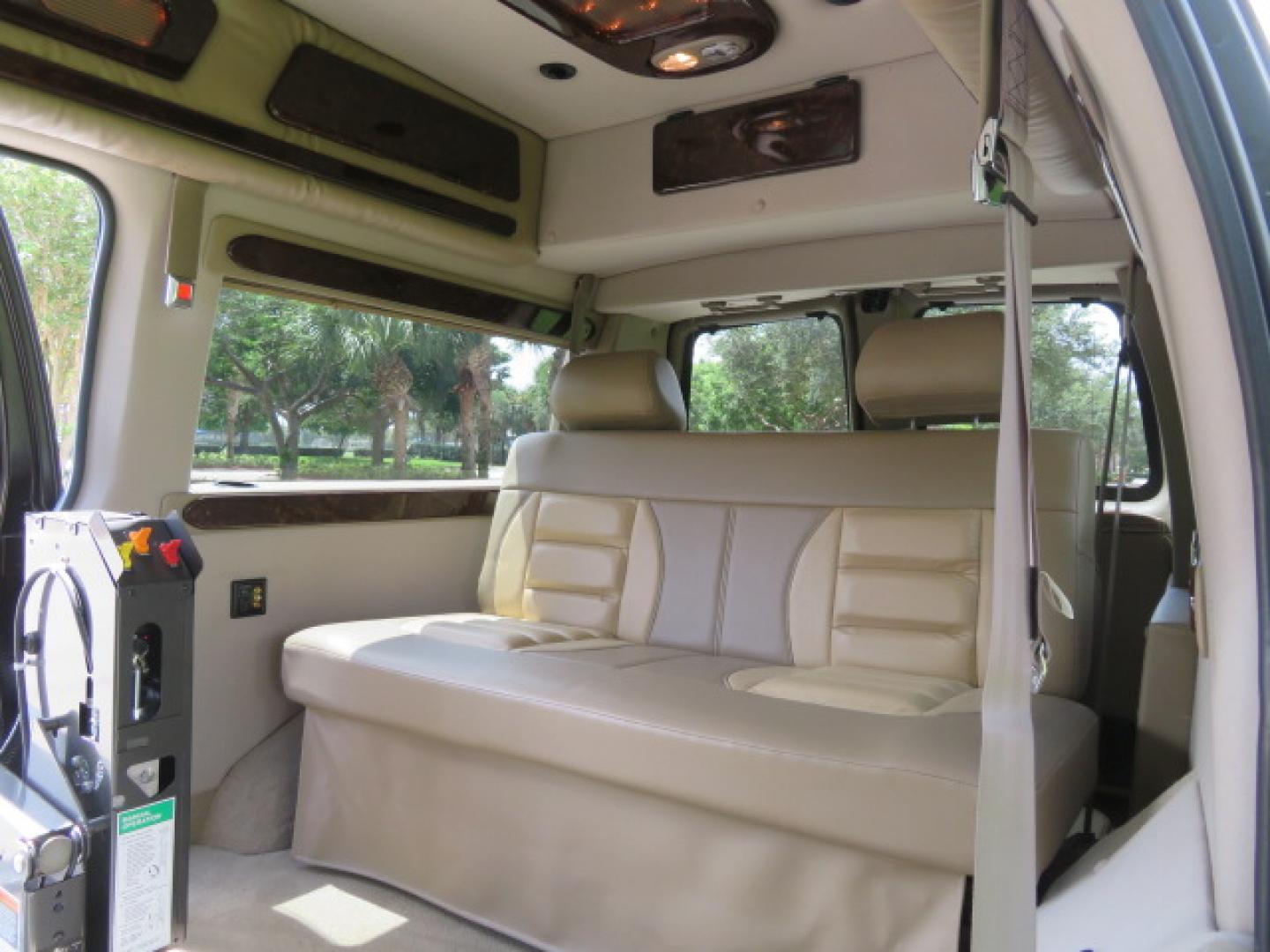 2014 /Beige Chevrolet Express G2500 3LT RV (1GBSGDC40E1) with an 5.3L V8 OHV 16V FFV engine, 6-Speed Automatic transmission, located at 4301 Oak Circle #19, Boca Raton, FL, 33431, (954) 561-2499, 26.388861, -80.084038 - You are looking at a Gorgeous 2014 Chevy Express High Top Handicap Wheelchair Conversion Van with Only 5100 Original Miles Fully Loaded with: 8 Door Package, American Luxury Conversion Package, Almost Brand New Side Entry Power Braunability Wheelchair Lift with 750LB Capacity, Leather, Rear Entertai - Photo#51