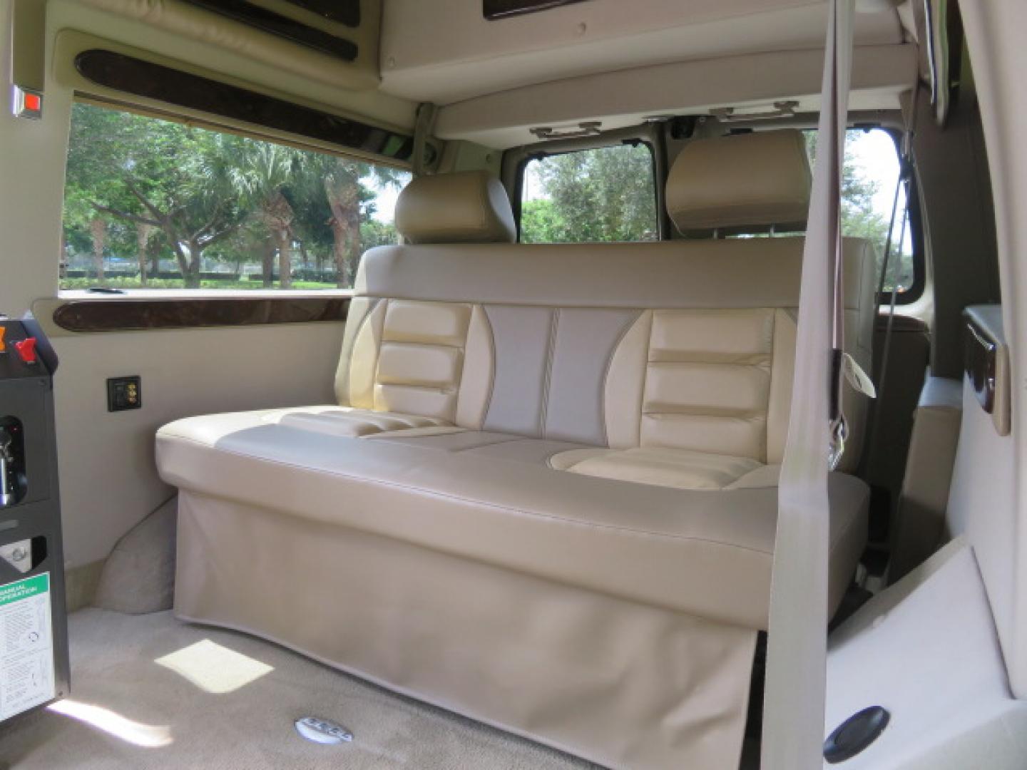 2014 /Beige Chevrolet Express G2500 3LT RV (1GBSGDC40E1) with an 5.3L V8 OHV 16V FFV engine, 6-Speed Automatic transmission, located at 4301 Oak Circle #19, Boca Raton, FL, 33431, (954) 561-2499, 26.388861, -80.084038 - You are looking at a Gorgeous 2014 Chevy Express High Top Handicap Wheelchair Conversion Van with Only 5100 Original Miles Fully Loaded with: 8 Door Package, American Luxury Conversion Package, Almost Brand New Side Entry Power Braunability Wheelchair Lift with 750LB Capacity, Leather, Rear Entertai - Photo#50