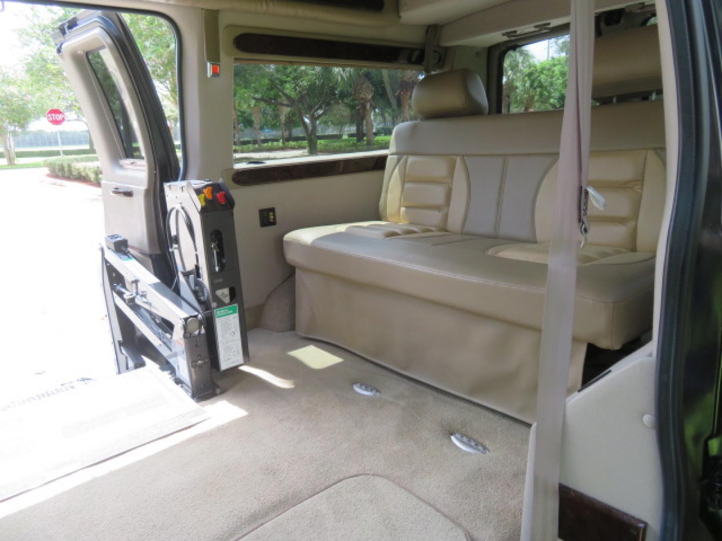 2014 /Beige Chevrolet Express G2500 3LT RV (1GBSGDC40E1) with an 5.3L V8 OHV 16V FFV engine, 6-Speed Automatic transmission, located at 4301 Oak Circle #19, Boca Raton, FL, 33431, (954) 561-2499, 26.388861, -80.084038 - You are looking at a Gorgeous 2014 Chevy Express High Top Handicap Wheelchair Conversion Van with Only 5100 Original Miles Fully Loaded with: 8 Door Package, American Luxury Conversion Package, Almost Brand New Side Entry Power Braunability Wheelchair Lift with 750LB Capacity, Leather, Rear Entertai - Photo#52