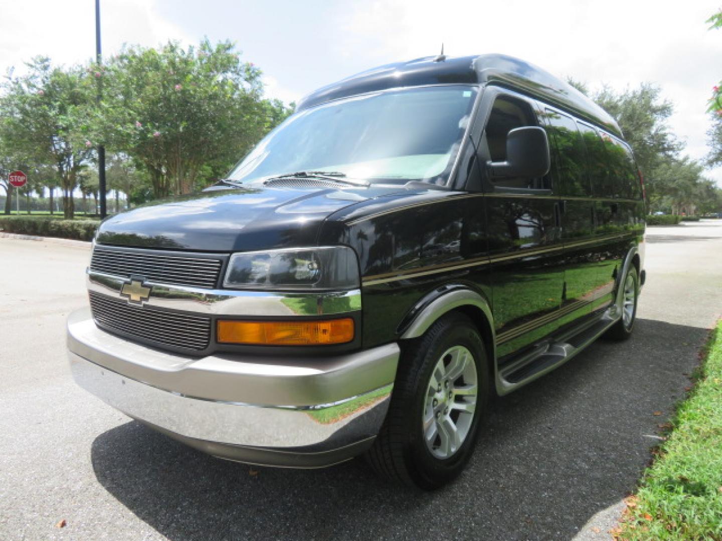 2014 /Beige Chevrolet Express G2500 3LT RV (1GBSGDC40E1) with an 5.3L V8 OHV 16V FFV engine, 6-Speed Automatic transmission, located at 4301 Oak Circle #19, Boca Raton, FL, 33431, (954) 561-2499, 26.388861, -80.084038 - You are looking at a Gorgeous 2014 Chevy Express High Top Handicap Wheelchair Conversion Van with Only 5100 Original Miles Fully Loaded with: 8 Door Package, American Luxury Conversion Package, Almost Brand New Side Entry Power Braunability Wheelchair Lift with 750LB Capacity, Leather, Rear Entertai - Photo#8