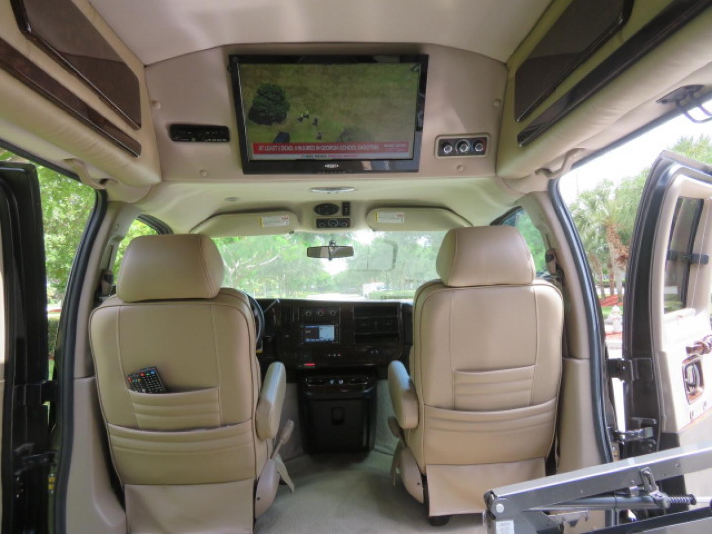 2014 /Beige Chevrolet Express G2500 3LT RV (1GBSGDC40E1) with an 5.3L V8 OHV 16V FFV engine, 6-Speed Automatic transmission, located at 4301 Oak Circle #19, Boca Raton, FL, 33431, (954) 561-2499, 26.388861, -80.084038 - You are looking at a Gorgeous 2014 Chevy Express High Top Handicap Wheelchair Conversion Van with Only 5100 Original Miles Fully Loaded with: 8 Door Package, American Luxury Conversion Package, Almost Brand New Side Entry Power Braunability Wheelchair Lift with 750LB Capacity, Leather, Rear Entertai - Photo#58