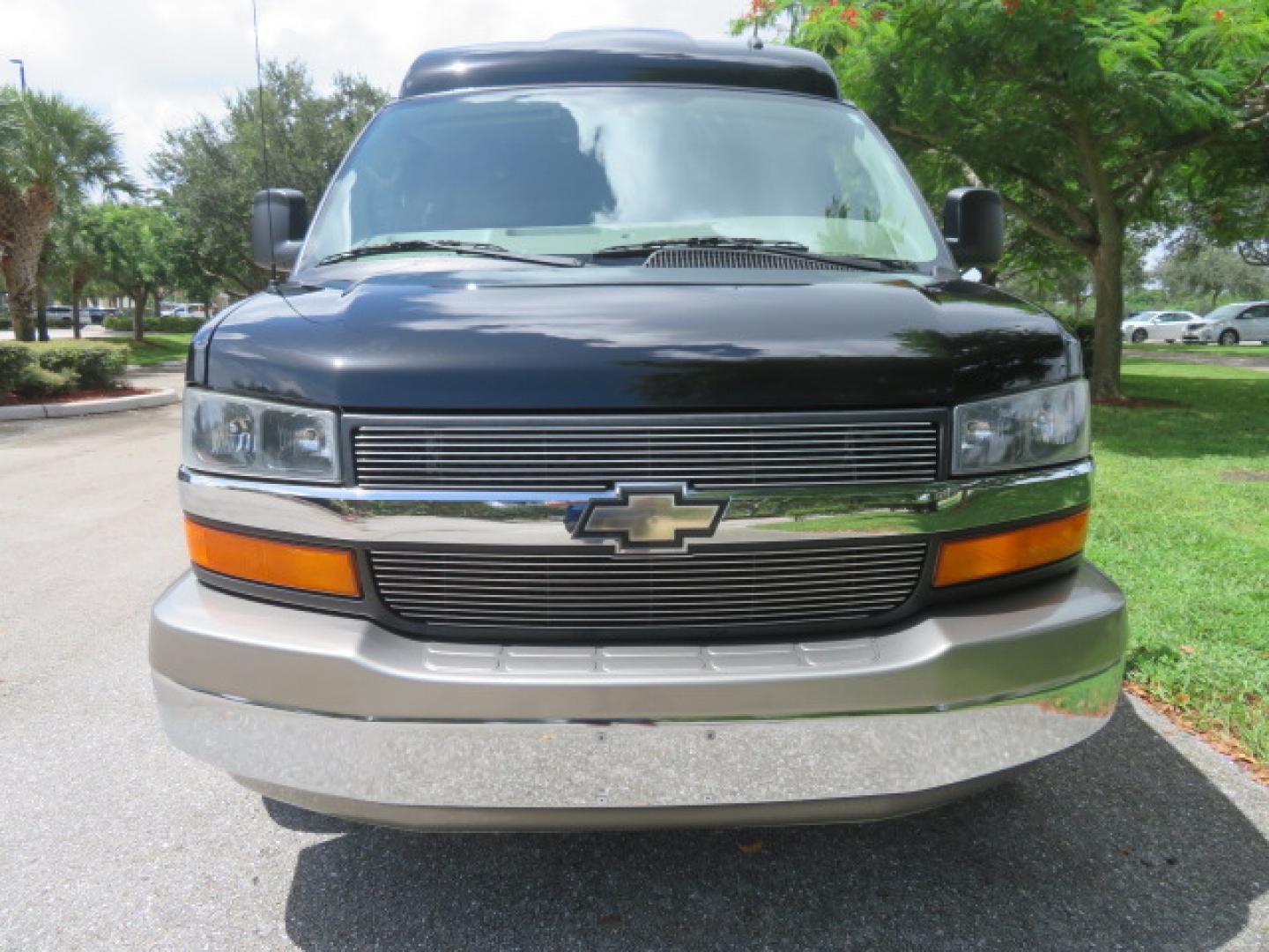 2014 /Beige Chevrolet Express G2500 3LT RV (1GBSGDC40E1) with an 5.3L V8 OHV 16V FFV engine, 6-Speed Automatic transmission, located at 4301 Oak Circle #19, Boca Raton, FL, 33431, (954) 561-2499, 26.388861, -80.084038 - You are looking at a Gorgeous 2014 Chevy Express High Top Handicap Wheelchair Conversion Van with Only 5100 Original Miles Fully Loaded with: 8 Door Package, American Luxury Conversion Package, Almost Brand New Side Entry Power Braunability Wheelchair Lift with 750LB Capacity, Leather, Rear Entertai - Photo#7