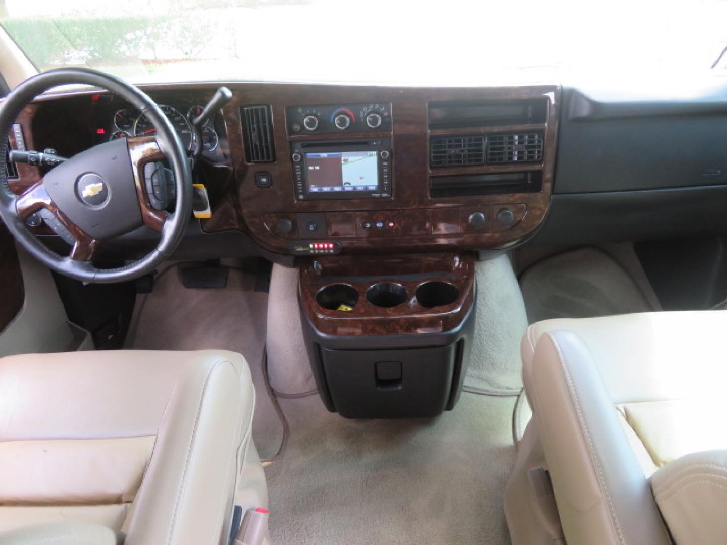 2014 /Beige Chevrolet Express G2500 3LT RV (1GBSGDC40E1) with an 5.3L V8 OHV 16V FFV engine, 6-Speed Automatic transmission, located at 4301 Oak Circle #19, Boca Raton, FL, 33431, (954) 561-2499, 26.388861, -80.084038 - You are looking at a Gorgeous 2014 Chevy Express High Top Handicap Wheelchair Conversion Van with Only 5100 Original Miles Fully Loaded with: 8 Door Package, American Luxury Conversion Package, Almost Brand New Side Entry Power Braunability Wheelchair Lift with 750LB Capacity, Leather, Rear Entertai - Photo#71