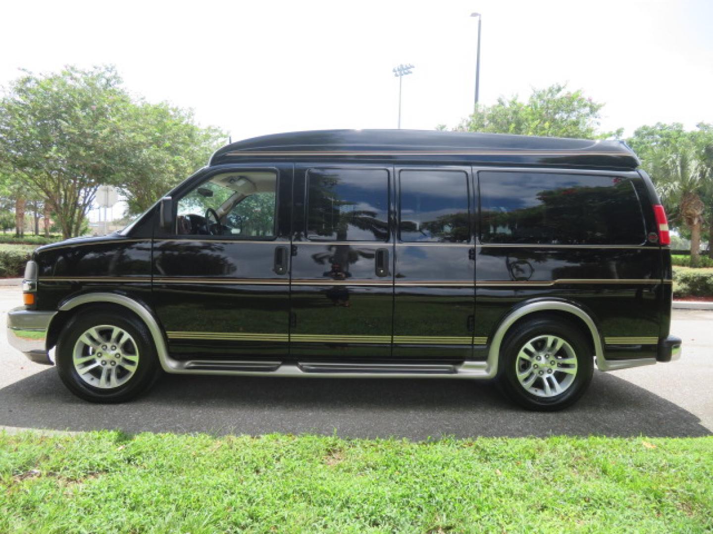 2014 /Beige Chevrolet Express G2500 3LT RV (1GBSGDC40E1) with an 5.3L V8 OHV 16V FFV engine, 6-Speed Automatic transmission, located at 4301 Oak Circle #19, Boca Raton, FL, 33431, (954) 561-2499, 26.388861, -80.084038 - You are looking at a Gorgeous 2014 Chevy Express High Top Handicap Wheelchair Conversion Van with Only 5100 Original Miles Fully Loaded with: 8 Door Package, American Luxury Conversion Package, Almost Brand New Side Entry Power Braunability Wheelchair Lift with 750LB Capacity, Leather, Rear Entertai - Photo#9