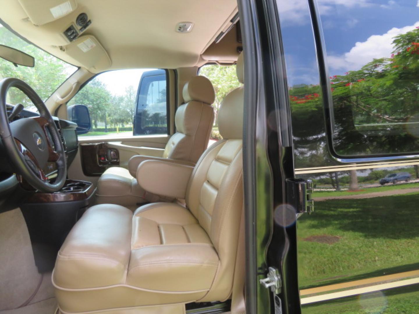 2014 /Beige Chevrolet Express G2500 3LT RV (1GBSGDC40E1) with an 5.3L V8 OHV 16V FFV engine, 6-Speed Automatic transmission, located at 4301 Oak Circle #19, Boca Raton, FL, 33431, (954) 561-2499, 26.388861, -80.084038 - You are looking at a Gorgeous 2014 Chevy Express High Top Handicap Wheelchair Conversion Van with Only 5100 Original Miles Fully Loaded with: 8 Door Package, American Luxury Conversion Package, Almost Brand New Side Entry Power Braunability Wheelchair Lift with 750LB Capacity, Leather, Rear Entertai - Photo#75