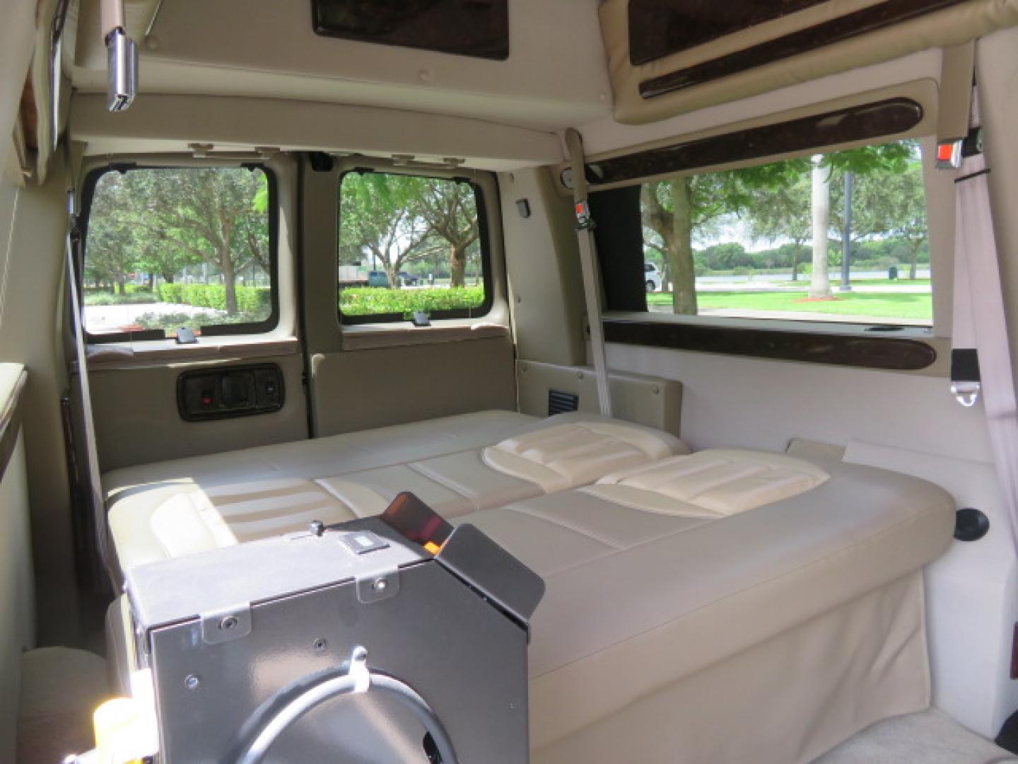 2014 /Beige Chevrolet Express G2500 3LT RV (1GBSGDC40E1) with an 5.3L V8 OHV 16V FFV engine, 6-Speed Automatic transmission, located at 4301 Oak Circle #19, Boca Raton, FL, 33431, (954) 561-2499, 26.388861, -80.084038 - You are looking at a Gorgeous 2014 Chevy Express High Top Handicap Wheelchair Conversion Van with Only 5100 Original Miles Fully Loaded with: 8 Door Package, American Luxury Conversion Package, Almost Brand New Side Entry Power Braunability Wheelchair Lift with 750LB Capacity, Leather, Rear Entertai - Photo#97