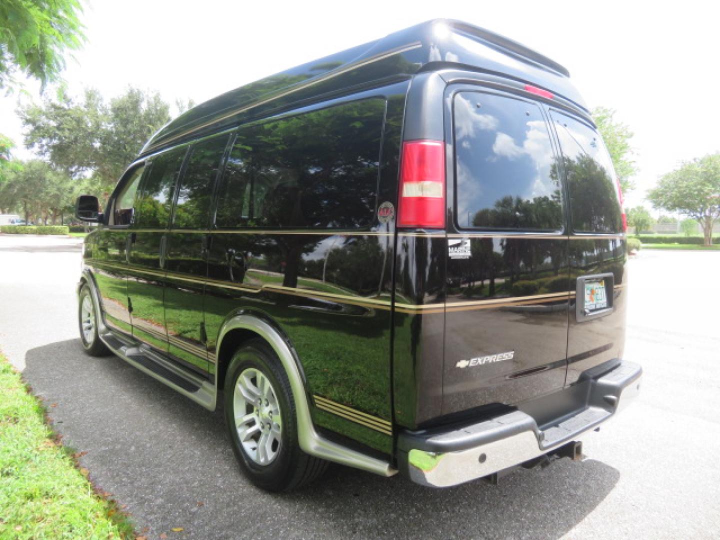 2014 /Beige Chevrolet Express G2500 3LT RV (1GBSGDC40E1) with an 5.3L V8 OHV 16V FFV engine, 6-Speed Automatic transmission, located at 4301 Oak Circle #19, Boca Raton, FL, 33431, (954) 561-2499, 26.388861, -80.084038 - You are looking at a Gorgeous 2014 Chevy Express High Top Handicap Wheelchair Conversion Van with Only 5100 Original Miles Fully Loaded with: 8 Door Package, American Luxury Conversion Package, Almost Brand New Side Entry Power Braunability Wheelchair Lift with 750LB Capacity, Leather, Rear Entertai - Photo#10