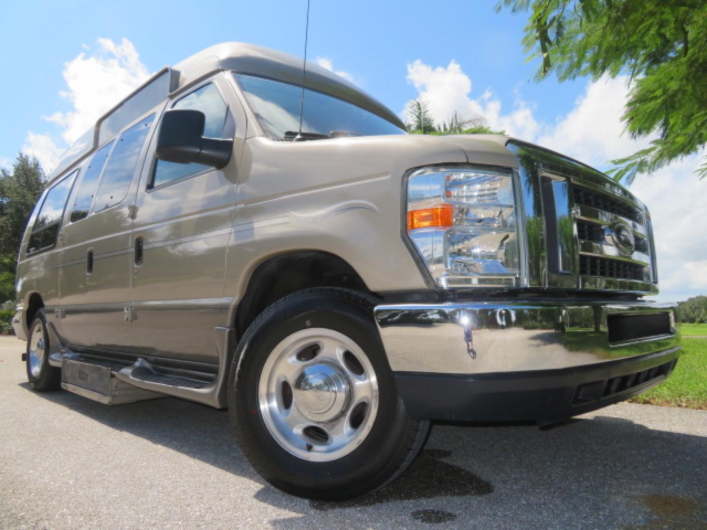 2013 Gold /Beige Ford E-Series Van E-150 (1FDNE1EL2DD) with an 5.4L V8 SOHC 16V FFV engine, 4-Speed Automatic transmission, located at 4301 Oak Circle #19, Boca Raton, FL, 33431, (954) 561-2499, 26.388861, -80.084038 - You are looking at a Gorgeous 2013 Ford Econoline E150 High Top Handicap Wheelchair Conversion Van with 43K Original Miles, Remote Powered Braun UVL Side Entry Wheelchair Lift, Power Side Entry Doors, Expanded Side Entry Doors, Hard Rubber Wheelchair Flooring in the rear of the vehicle, EZ Lock in t - Photo#2