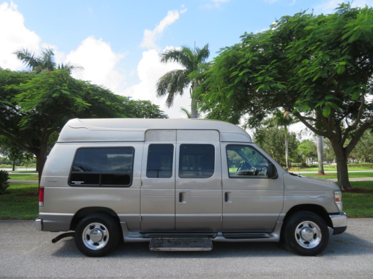 2013 Gold /Beige Ford E-Series Van E-150 (1FDNE1EL2DD) with an 5.4L V8 SOHC 16V FFV engine, 4-Speed Automatic transmission, located at 4301 Oak Circle #19, Boca Raton, FL, 33431, (954) 561-2499, 26.388861, -80.084038 - You are looking at a Gorgeous 2013 Ford Econoline E150 High Top Handicap Wheelchair Conversion Van with 43K Original Miles, Remote Powered Braun UVL Side Entry Wheelchair Lift, Power Side Entry Doors, Expanded Side Entry Doors, Hard Rubber Wheelchair Flooring in the rear of the vehicle, EZ Lock in t - Photo#4