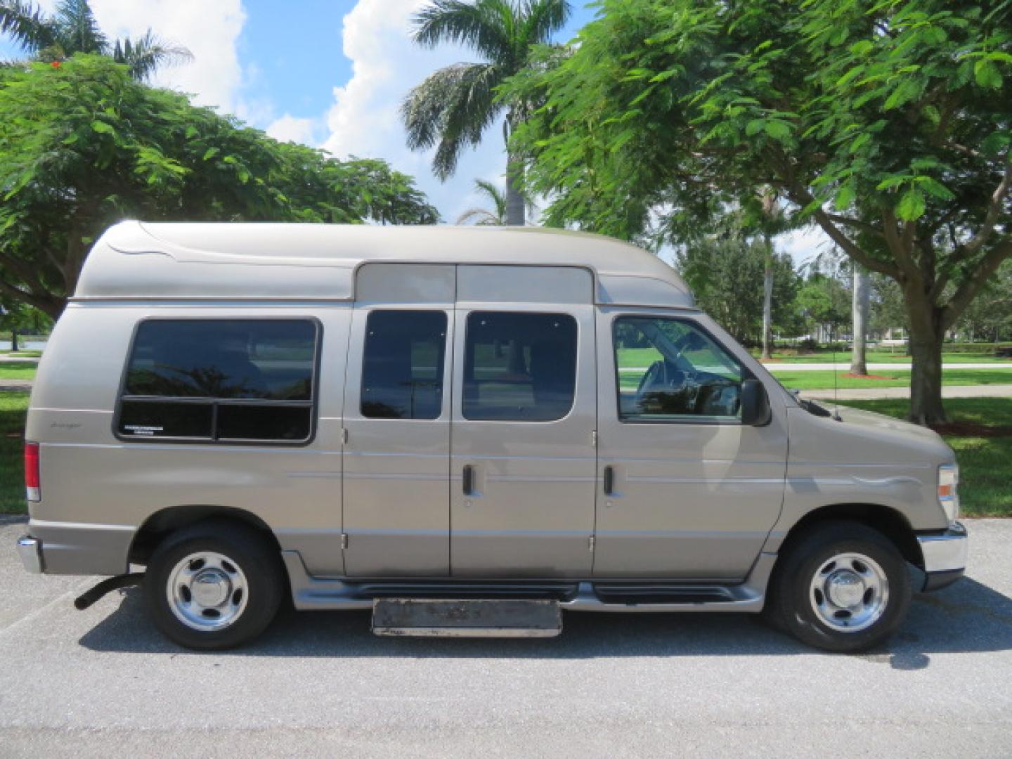 2013 Gold /Beige Ford E-Series Van E-150 (1FDNE1EL2DD) with an 5.4L V8 SOHC 16V FFV engine, 4-Speed Automatic transmission, located at 4301 Oak Circle #19, Boca Raton, FL, 33431, (954) 561-2499, 26.388861, -80.084038 - You are looking at a Gorgeous 2013 Ford Econoline E150 High Top Handicap Wheelchair Conversion Van with 43K Original Miles, Remote Powered Braun UVL Side Entry Wheelchair Lift, Power Side Entry Doors, Expanded Side Entry Doors, Hard Rubber Wheelchair Flooring in the rear of the vehicle, EZ Lock in t - Photo#17