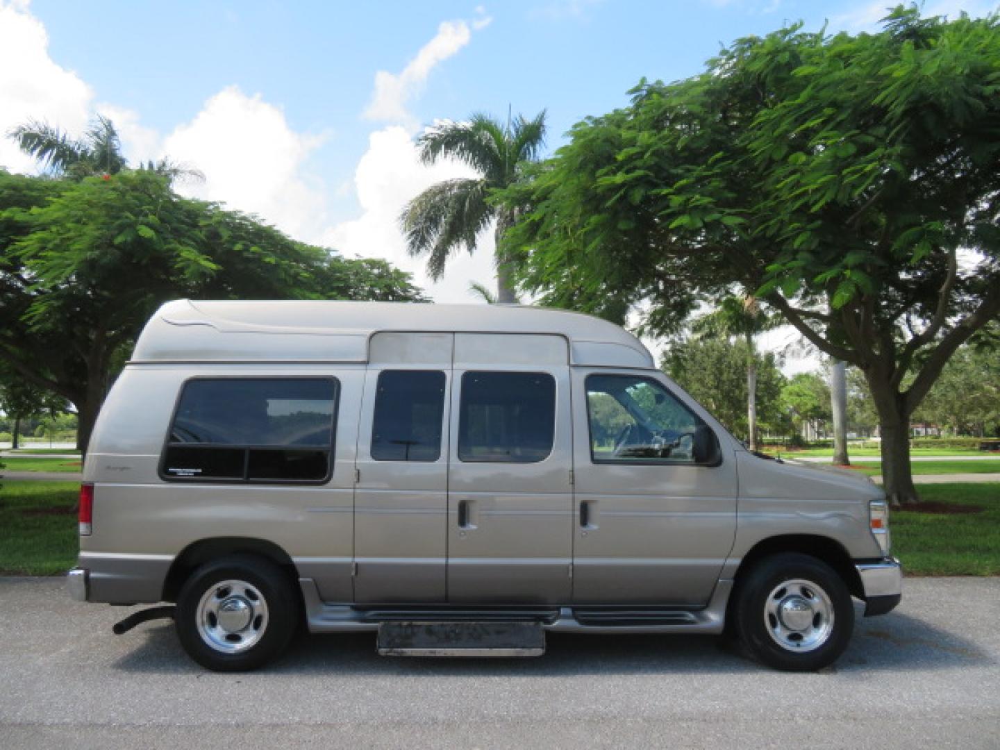 2013 Gold /Beige Ford E-Series Van E-150 (1FDNE1EL2DD) with an 5.4L V8 SOHC 16V FFV engine, 4-Speed Automatic transmission, located at 4301 Oak Circle #19, Boca Raton, FL, 33431, (954) 561-2499, 26.388861, -80.084038 - You are looking at a Gorgeous 2013 Ford Econoline E150 High Top Handicap Wheelchair Conversion Van with 43K Original Miles, Remote Powered Braun UVL Side Entry Wheelchair Lift, Power Side Entry Doors, Expanded Side Entry Doors, Hard Rubber Wheelchair Flooring in the rear of the vehicle, EZ Lock in t - Photo#3