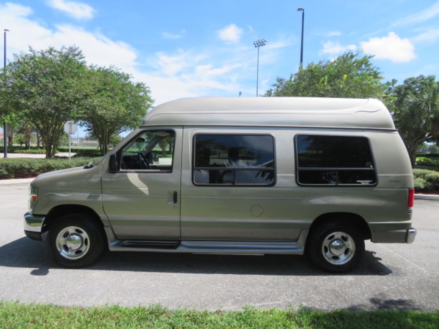 2013 Gold /Beige Ford E-Series Van E-150 (1FDNE1EL2DD) with an 5.4L V8 SOHC 16V FFV engine, 4-Speed Automatic transmission, located at 4301 Oak Circle #19, Boca Raton, FL, 33431, (954) 561-2499, 26.388861, -80.084038 - You are looking at a Gorgeous 2013 Ford Econoline E150 High Top Handicap Wheelchair Conversion Van with 43K Original Miles, Remote Powered Braun UVL Side Entry Wheelchair Lift, Power Side Entry Doors, Expanded Side Entry Doors, Hard Rubber Wheelchair Flooring in the rear of the vehicle, EZ Lock in t - Photo#23