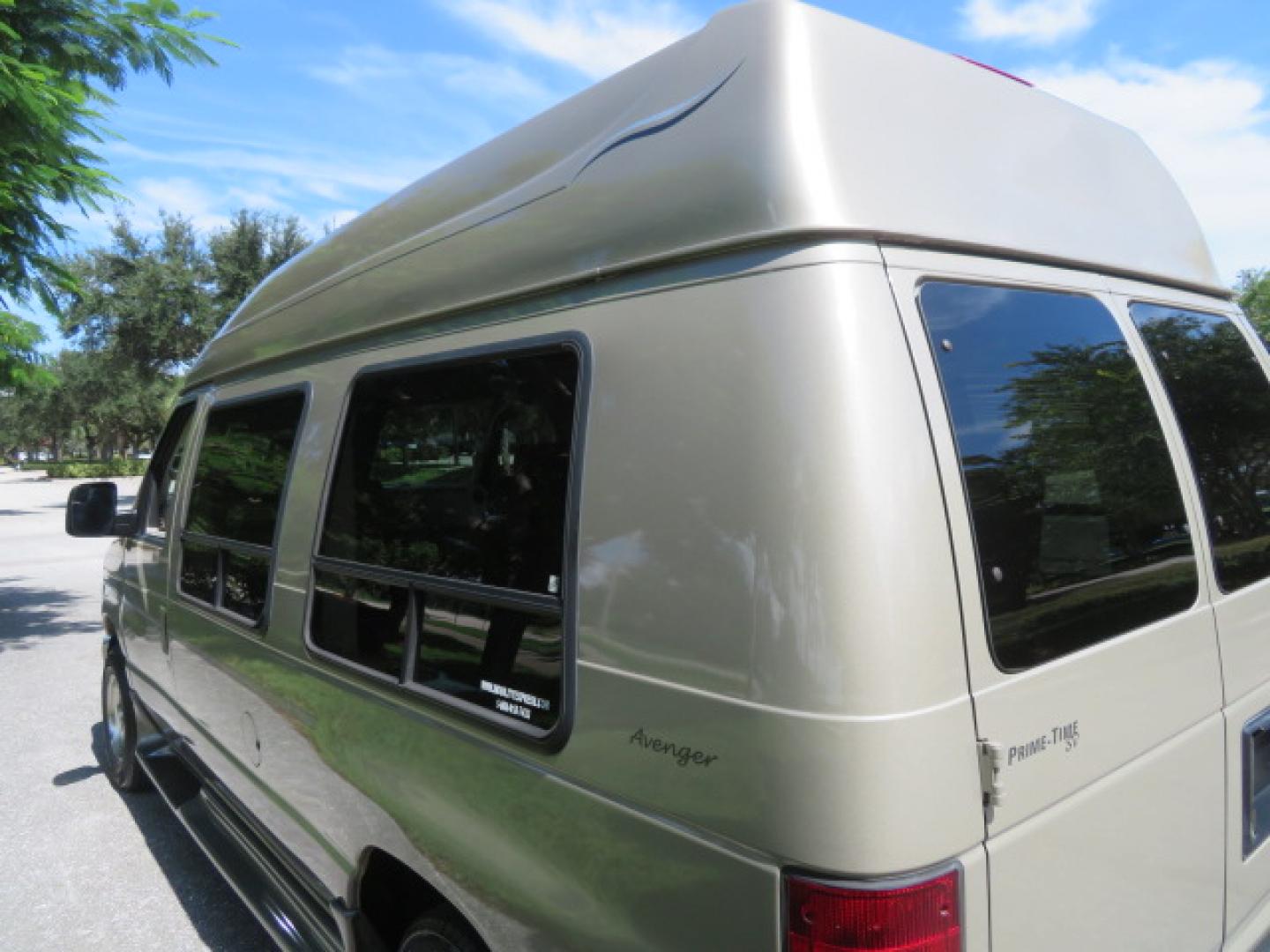 2013 Gold /Beige Ford E-Series Van E-150 (1FDNE1EL2DD) with an 5.4L V8 SOHC 16V FFV engine, 4-Speed Automatic transmission, located at 4301 Oak Circle #19, Boca Raton, FL, 33431, (954) 561-2499, 26.388861, -80.084038 - You are looking at a Gorgeous 2013 Ford Econoline E150 High Top Handicap Wheelchair Conversion Van with 43K Original Miles, Remote Powered Braun UVL Side Entry Wheelchair Lift, Power Side Entry Doors, Expanded Side Entry Doors, Hard Rubber Wheelchair Flooring in the rear of the vehicle, EZ Lock in t - Photo#31