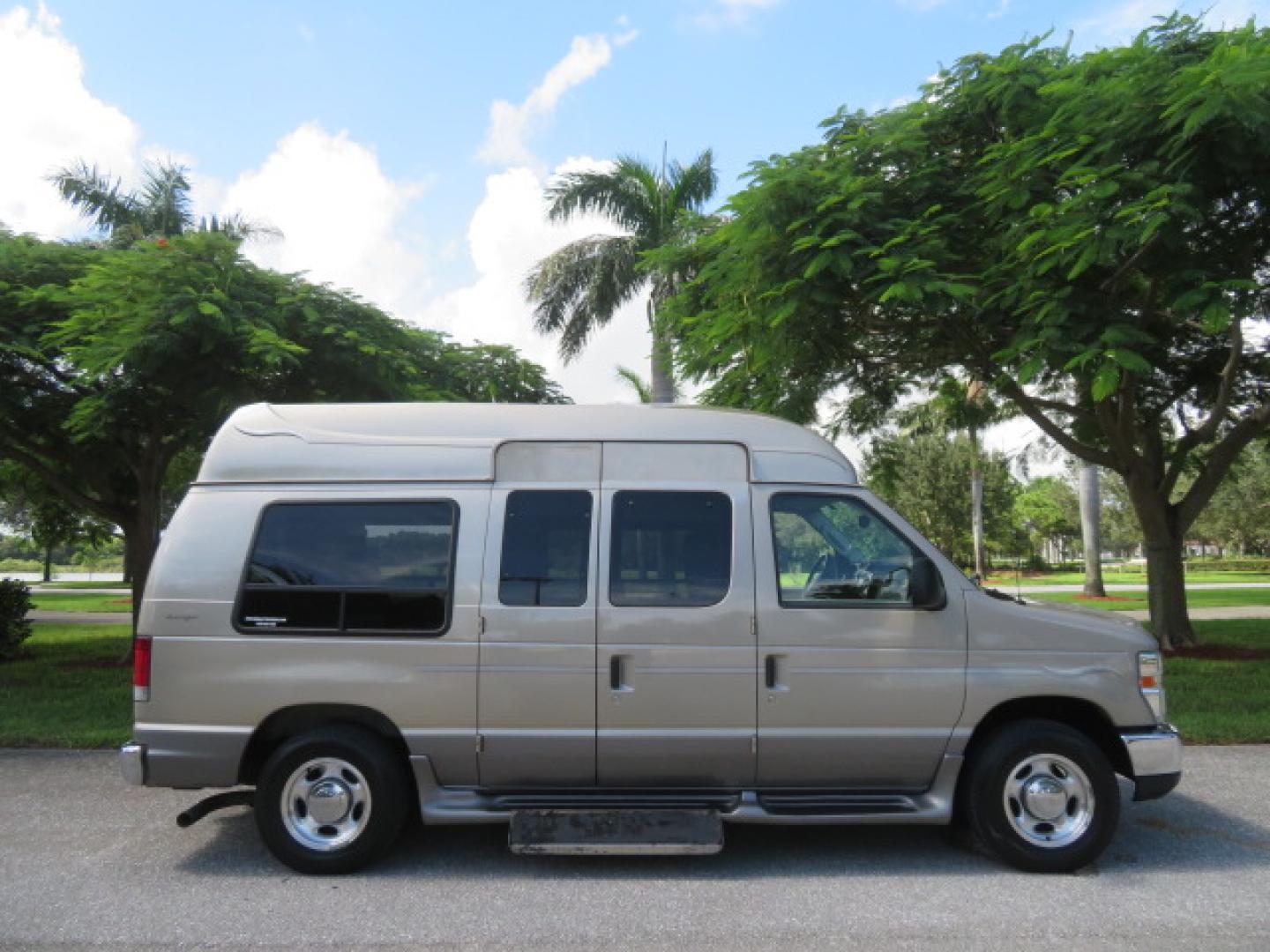 2013 Gold /Beige Ford E-Series Van E-150 (1FDNE1EL2DD) with an 5.4L V8 SOHC 16V FFV engine, 4-Speed Automatic transmission, located at 4301 Oak Circle #19, Boca Raton, FL, 33431, (954) 561-2499, 26.388861, -80.084038 - You are looking at a Gorgeous 2013 Ford Econoline E150 High Top Handicap Wheelchair Conversion Van with 43K Original Miles, Remote Powered Braun UVL Side Entry Wheelchair Lift, Power Side Entry Doors, Expanded Side Entry Doors, Hard Rubber Wheelchair Flooring in the rear of the vehicle, EZ Lock in t - Photo#5