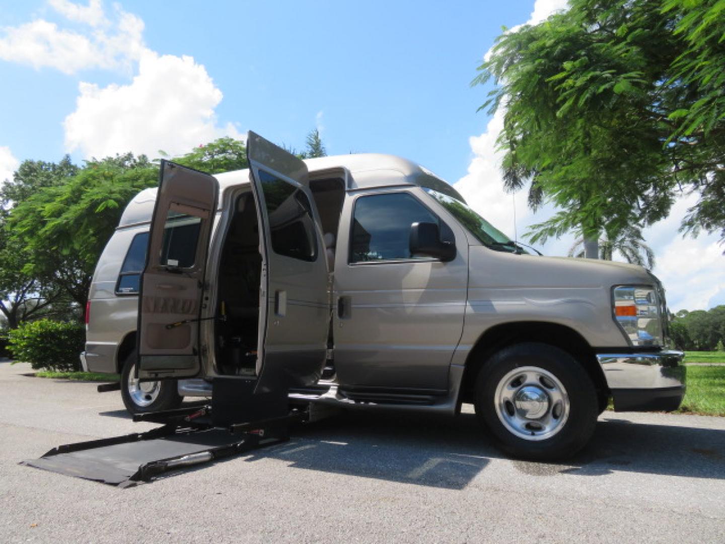 2013 Gold /Beige Ford E-Series Van E-150 (1FDNE1EL2DD) with an 5.4L V8 SOHC 16V FFV engine, 4-Speed Automatic transmission, located at 4301 Oak Circle #19, Boca Raton, FL, 33431, (954) 561-2499, 26.388861, -80.084038 - You are looking at a Gorgeous 2013 Ford Econoline E150 High Top Handicap Wheelchair Conversion Van with 43K Original Miles, Remote Powered Braun UVL Side Entry Wheelchair Lift, Power Side Entry Doors, Expanded Side Entry Doors, Hard Rubber Wheelchair Flooring in the rear of the vehicle, EZ Lock in t - Photo#40