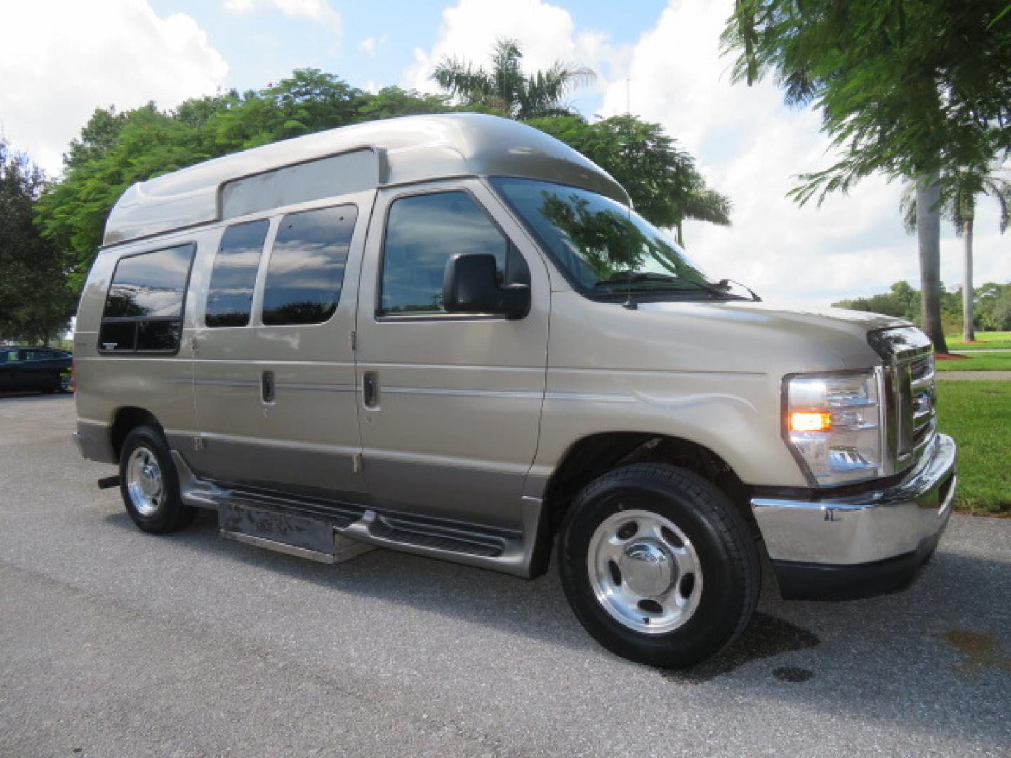 2013 Gold /Beige Ford E-Series Van E-150 (1FDNE1EL2DD) with an 5.4L V8 SOHC 16V FFV engine, 4-Speed Automatic transmission, located at 4301 Oak Circle #19, Boca Raton, FL, 33431, (954) 561-2499, 26.388861, -80.084038 - You are looking at a Gorgeous 2013 Ford Econoline E150 High Top Handicap Wheelchair Conversion Van with 43K Original Miles, Remote Powered Braun UVL Side Entry Wheelchair Lift, Power Side Entry Doors, Expanded Side Entry Doors, Hard Rubber Wheelchair Flooring in the rear of the vehicle, EZ Lock in t - Photo#6