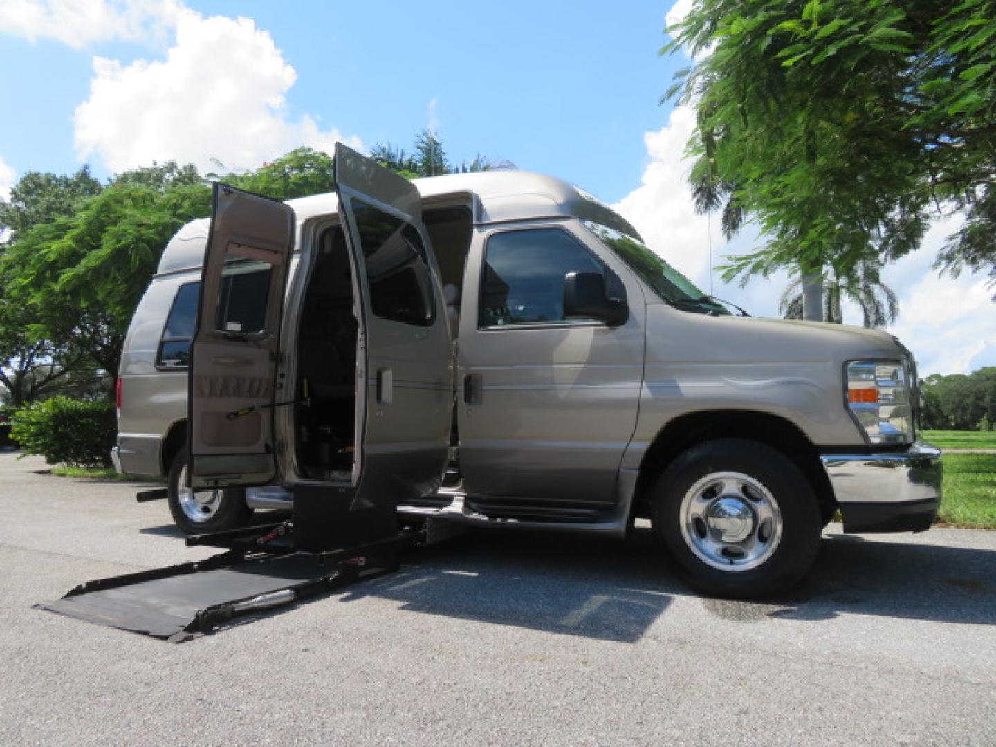 2013 Gold /Beige Ford E-Series Van E-150 (1FDNE1EL2DD) with an 5.4L V8 SOHC 16V FFV engine, 4-Speed Automatic transmission, located at 4301 Oak Circle #19, Boca Raton, FL, 33431, (954) 561-2499, 26.388861, -80.084038 - You are looking at a Gorgeous 2013 Ford Econoline E150 High Top Handicap Wheelchair Conversion Van with 43K Original Miles, Remote Powered Braun UVL Side Entry Wheelchair Lift, Power Side Entry Doors, Expanded Side Entry Doors, Hard Rubber Wheelchair Flooring in the rear of the vehicle, EZ Lock in t - Photo#41