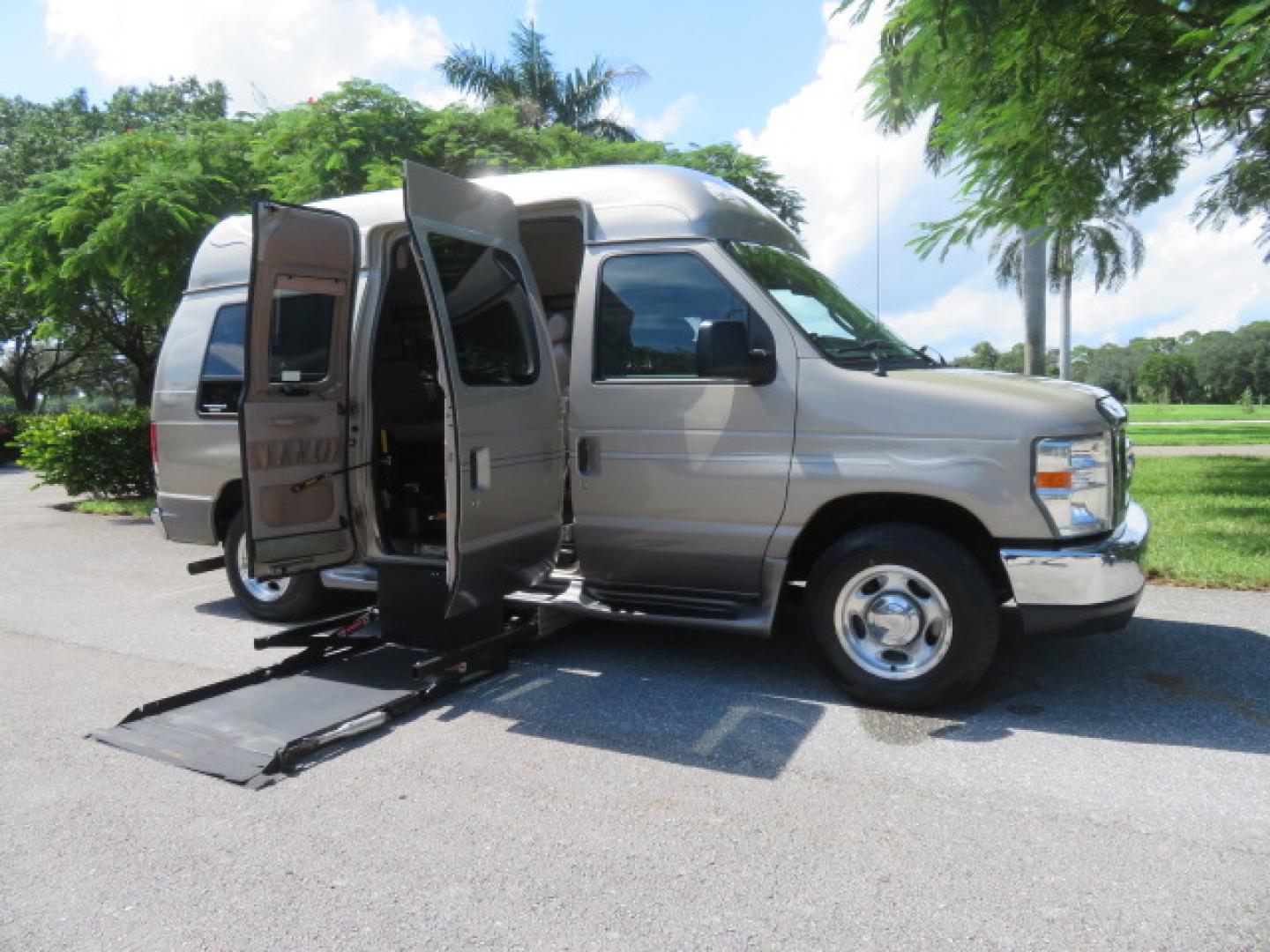 2013 Gold /Beige Ford E-Series Van E-150 (1FDNE1EL2DD) with an 5.4L V8 SOHC 16V FFV engine, 4-Speed Automatic transmission, located at 4301 Oak Circle #19, Boca Raton, FL, 33431, (954) 561-2499, 26.388861, -80.084038 - You are looking at a Gorgeous 2013 Ford Econoline E150 High Top Handicap Wheelchair Conversion Van with 43K Original Miles, Remote Powered Braun UVL Side Entry Wheelchair Lift, Power Side Entry Doors, Expanded Side Entry Doors, Hard Rubber Wheelchair Flooring in the rear of the vehicle, EZ Lock in t - Photo#42