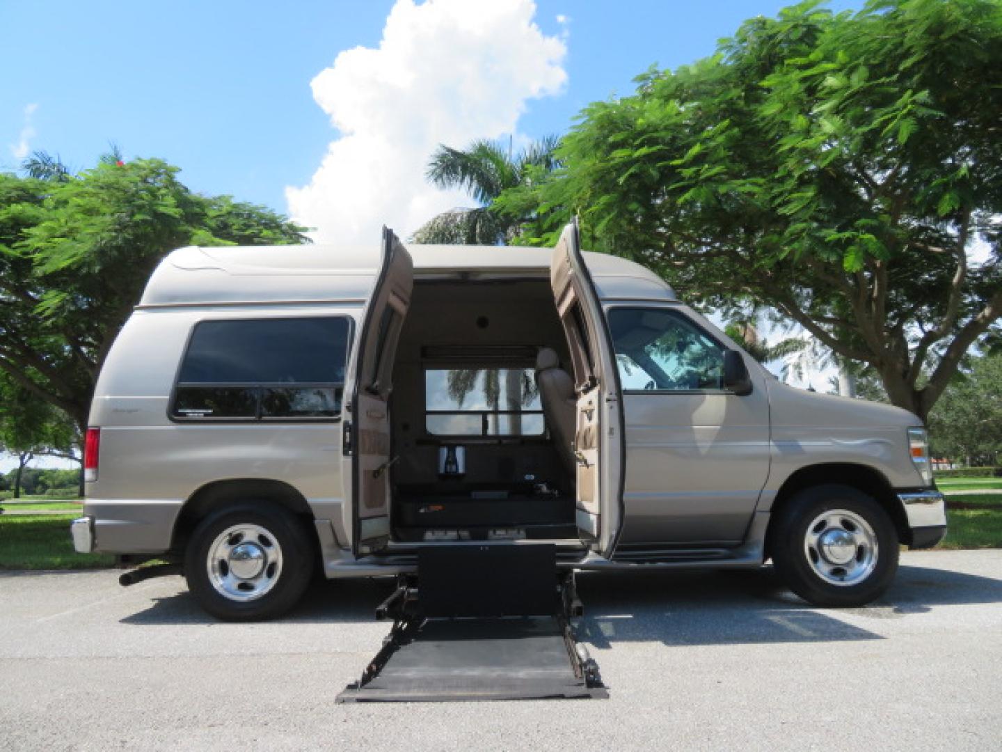 2013 Gold /Beige Ford E-Series Van E-150 (1FDNE1EL2DD) with an 5.4L V8 SOHC 16V FFV engine, 4-Speed Automatic transmission, located at 4301 Oak Circle #19, Boca Raton, FL, 33431, (954) 561-2499, 26.388861, -80.084038 - You are looking at a Gorgeous 2013 Ford Econoline E150 High Top Handicap Wheelchair Conversion Van with 43K Original Miles, Remote Powered Braun UVL Side Entry Wheelchair Lift, Power Side Entry Doors, Expanded Side Entry Doors, Hard Rubber Wheelchair Flooring in the rear of the vehicle, EZ Lock in t - Photo#43