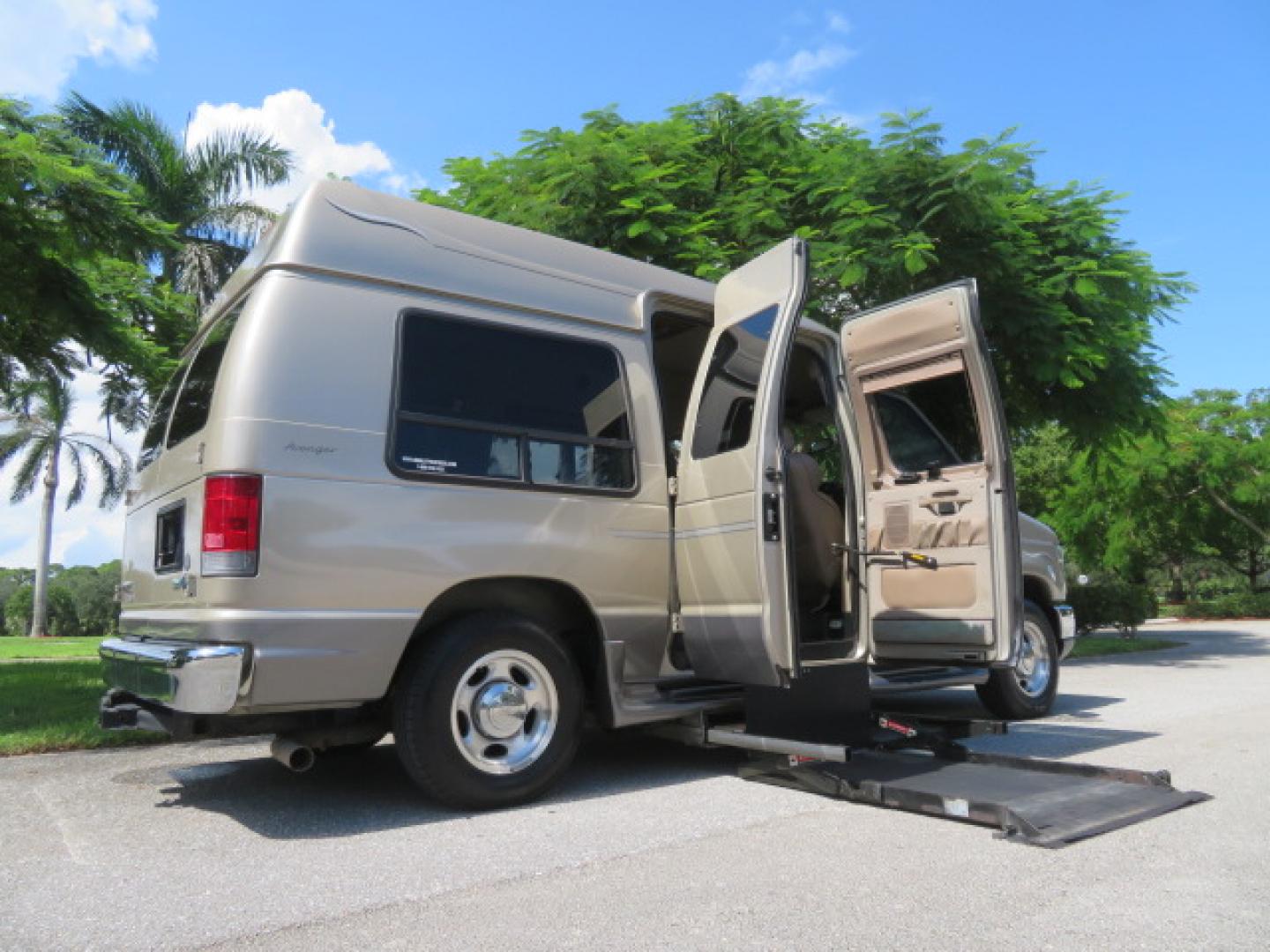 2013 Gold /Beige Ford E-Series Van E-150 (1FDNE1EL2DD) with an 5.4L V8 SOHC 16V FFV engine, 4-Speed Automatic transmission, located at 4301 Oak Circle #19, Boca Raton, FL, 33431, (954) 561-2499, 26.388861, -80.084038 - You are looking at a Gorgeous 2013 Ford Econoline E150 High Top Handicap Wheelchair Conversion Van with 43K Original Miles, Remote Powered Braun UVL Side Entry Wheelchair Lift, Power Side Entry Doors, Expanded Side Entry Doors, Hard Rubber Wheelchair Flooring in the rear of the vehicle, EZ Lock in t - Photo#47