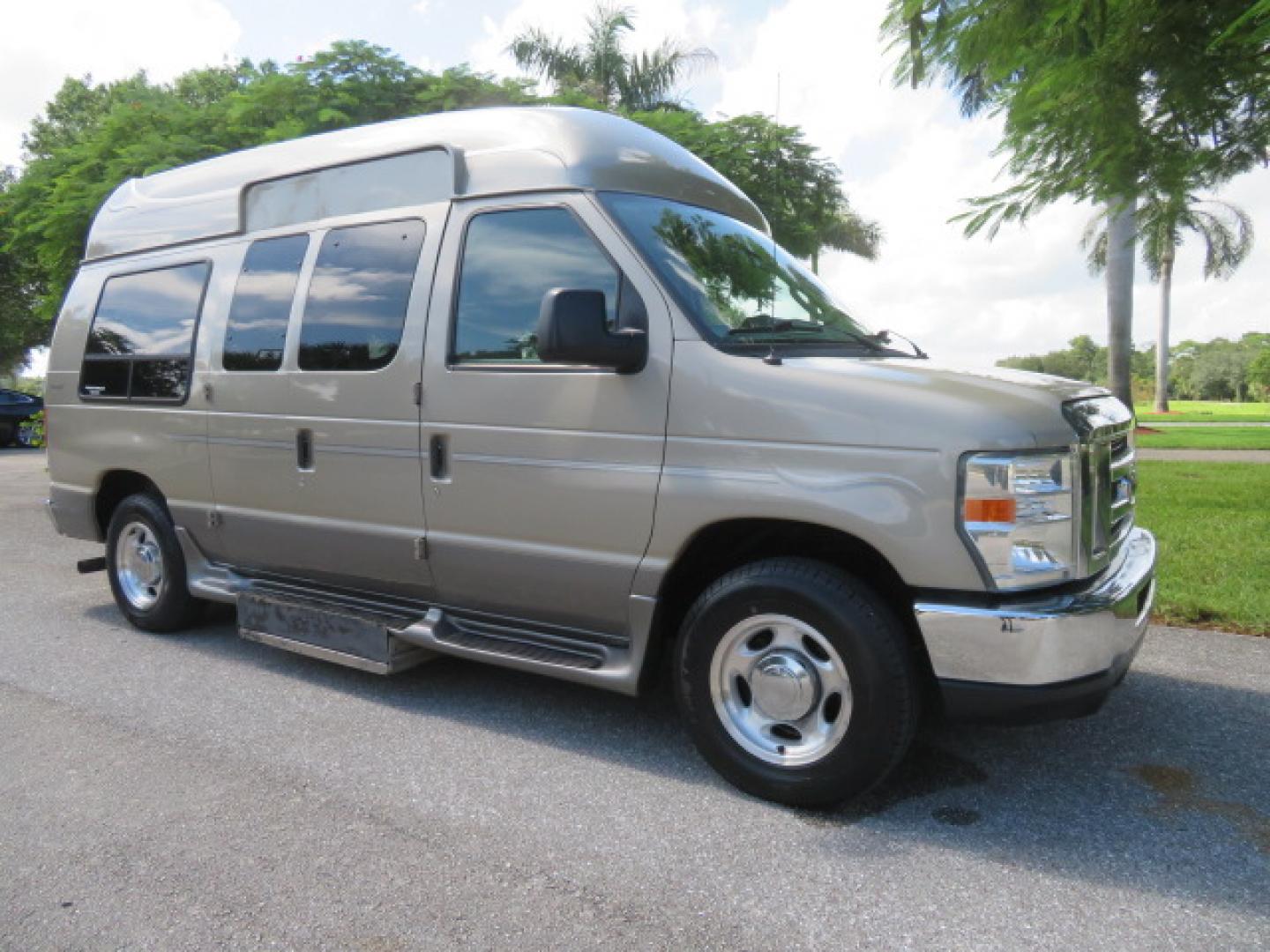 2013 Gold /Beige Ford E-Series Van E-150 (1FDNE1EL2DD) with an 5.4L V8 SOHC 16V FFV engine, 4-Speed Automatic transmission, located at 4301 Oak Circle #19, Boca Raton, FL, 33431, (954) 561-2499, 26.388861, -80.084038 - You are looking at a Gorgeous 2013 Ford Econoline E150 High Top Handicap Wheelchair Conversion Van with 43K Original Miles, Remote Powered Braun UVL Side Entry Wheelchair Lift, Power Side Entry Doors, Expanded Side Entry Doors, Hard Rubber Wheelchair Flooring in the rear of the vehicle, EZ Lock in t - Photo#7