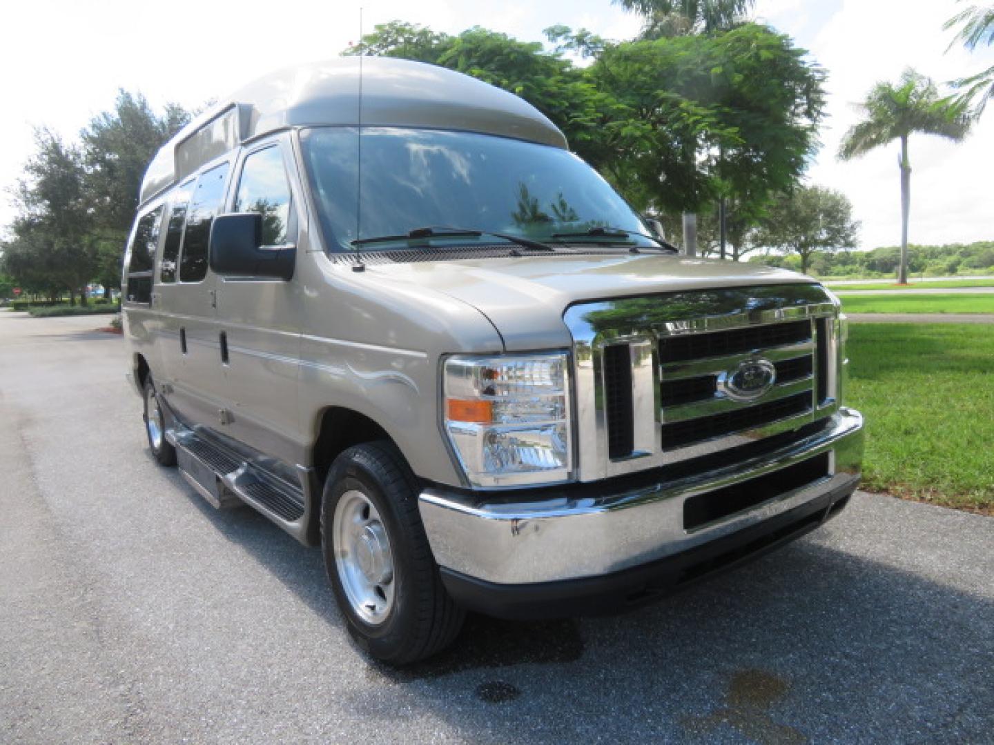 2013 Gold /Beige Ford E-Series Van E-150 (1FDNE1EL2DD) with an 5.4L V8 SOHC 16V FFV engine, 4-Speed Automatic transmission, located at 4301 Oak Circle #19, Boca Raton, FL, 33431, (954) 561-2499, 26.388861, -80.084038 - You are looking at a Gorgeous 2013 Ford Econoline E150 High Top Handicap Wheelchair Conversion Van with 43K Original Miles, Remote Powered Braun UVL Side Entry Wheelchair Lift, Power Side Entry Doors, Expanded Side Entry Doors, Hard Rubber Wheelchair Flooring in the rear of the vehicle, EZ Lock in t - Photo#8