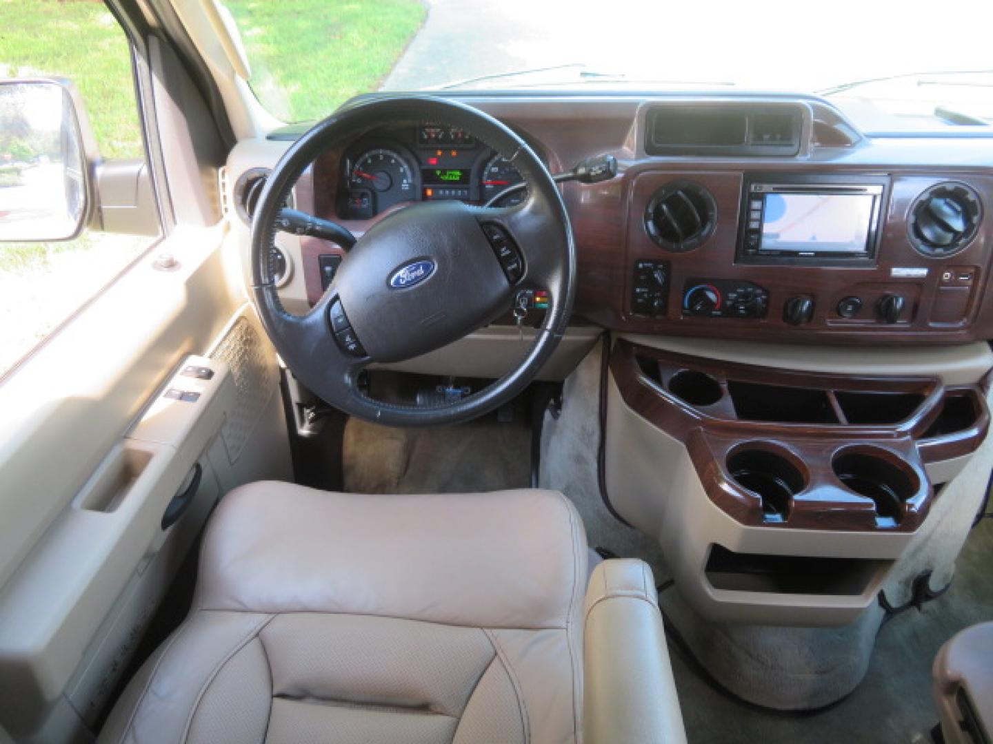 2013 Gold /Beige Ford E-Series Van E-150 (1FDNE1EL2DD) with an 5.4L V8 SOHC 16V FFV engine, 4-Speed Automatic transmission, located at 4301 Oak Circle #19, Boca Raton, FL, 33431, (954) 561-2499, 26.388861, -80.084038 - You are looking at a Gorgeous 2013 Ford Econoline E150 High Top Handicap Wheelchair Conversion Van with 43K Original Miles, Remote Powered Braun UVL Side Entry Wheelchair Lift, Power Side Entry Doors, Expanded Side Entry Doors, Hard Rubber Wheelchair Flooring in the rear of the vehicle, EZ Lock in t - Photo#64