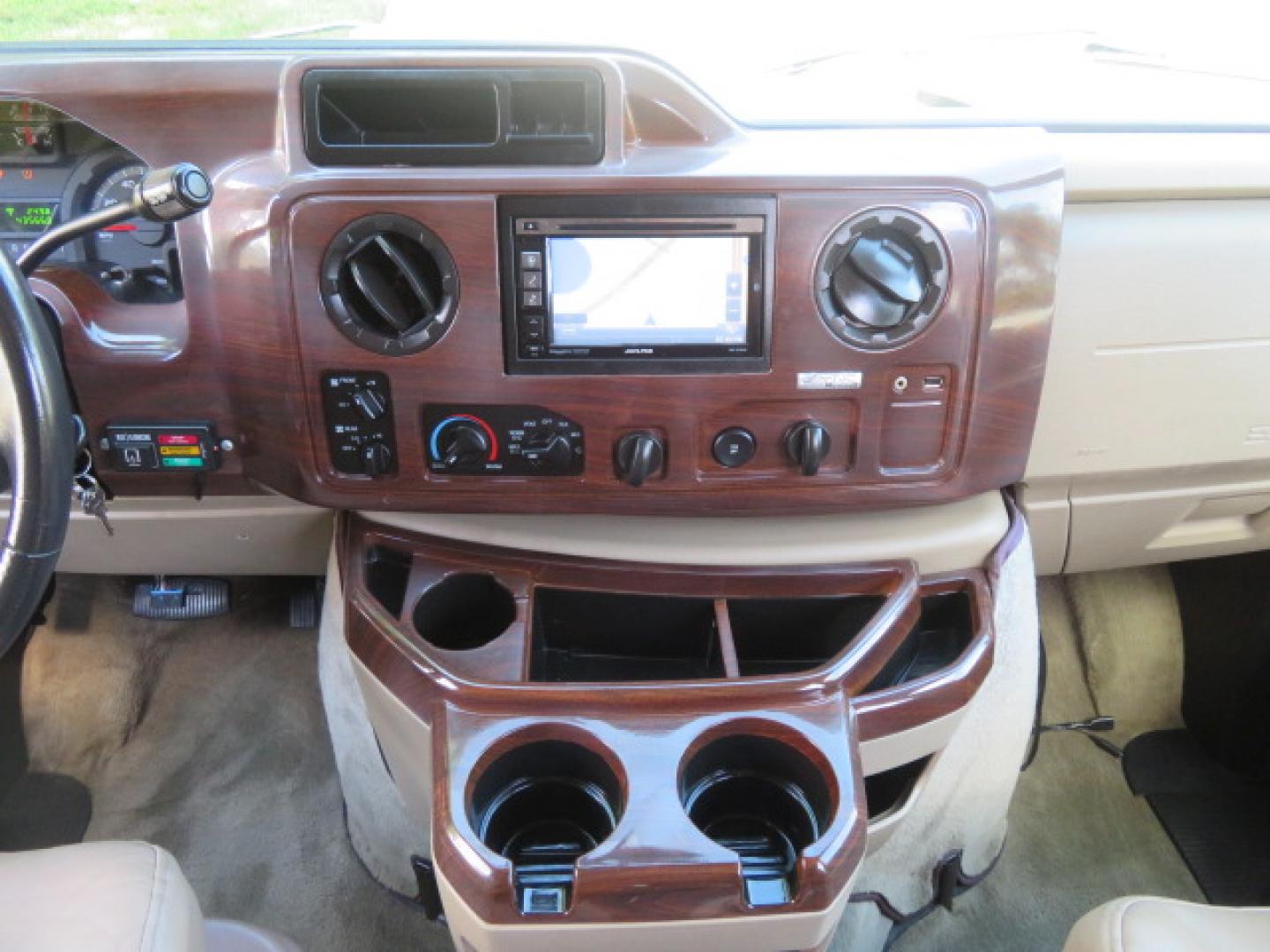 2013 Gold /Beige Ford E-Series Van E-150 (1FDNE1EL2DD) with an 5.4L V8 SOHC 16V FFV engine, 4-Speed Automatic transmission, located at 4301 Oak Circle #19, Boca Raton, FL, 33431, (954) 561-2499, 26.388861, -80.084038 - You are looking at a Gorgeous 2013 Ford Econoline E150 High Top Handicap Wheelchair Conversion Van with 43K Original Miles, Remote Powered Braun UVL Side Entry Wheelchair Lift, Power Side Entry Doors, Expanded Side Entry Doors, Hard Rubber Wheelchair Flooring in the rear of the vehicle, EZ Lock in t - Photo#66