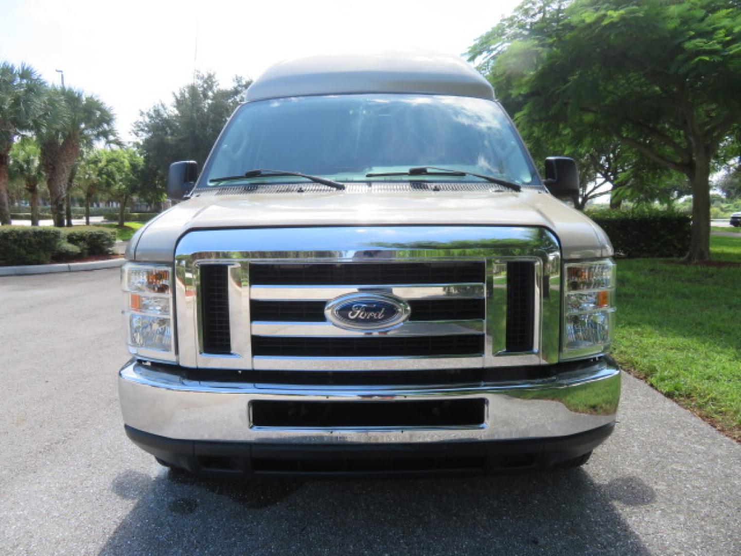 2013 Gold /Beige Ford E-Series Van E-150 (1FDNE1EL2DD) with an 5.4L V8 SOHC 16V FFV engine, 4-Speed Automatic transmission, located at 4301 Oak Circle #19, Boca Raton, FL, 33431, (954) 561-2499, 26.388861, -80.084038 - You are looking at a Gorgeous 2013 Ford Econoline E150 High Top Handicap Wheelchair Conversion Van with 43K Original Miles, Remote Powered Braun UVL Side Entry Wheelchair Lift, Power Side Entry Doors, Expanded Side Entry Doors, Hard Rubber Wheelchair Flooring in the rear of the vehicle, EZ Lock in t - Photo#9