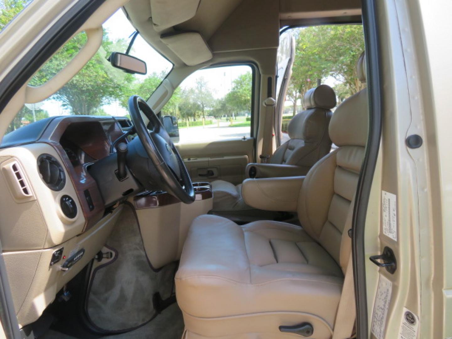 2013 Gold /Beige Ford E-Series Van E-150 (1FDNE1EL2DD) with an 5.4L V8 SOHC 16V FFV engine, 4-Speed Automatic transmission, located at 4301 Oak Circle #19, Boca Raton, FL, 33431, (954) 561-2499, 26.388861, -80.084038 - You are looking at a Gorgeous 2013 Ford Econoline E150 High Top Handicap Wheelchair Conversion Van with 43K Original Miles, Remote Powered Braun UVL Side Entry Wheelchair Lift, Power Side Entry Doors, Expanded Side Entry Doors, Hard Rubber Wheelchair Flooring in the rear of the vehicle, EZ Lock in t - Photo#85