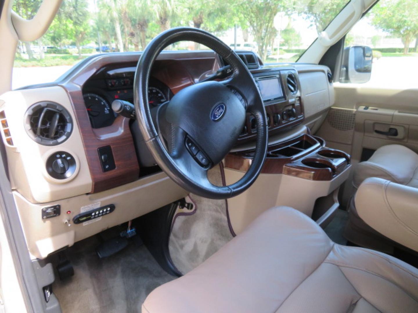 2013 Gold /Beige Ford E-Series Van E-150 (1FDNE1EL2DD) with an 5.4L V8 SOHC 16V FFV engine, 4-Speed Automatic transmission, located at 4301 Oak Circle #19, Boca Raton, FL, 33431, (954) 561-2499, 26.388861, -80.084038 - You are looking at a Gorgeous 2013 Ford Econoline E150 High Top Handicap Wheelchair Conversion Van with 43K Original Miles, Remote Powered Braun UVL Side Entry Wheelchair Lift, Power Side Entry Doors, Expanded Side Entry Doors, Hard Rubber Wheelchair Flooring in the rear of the vehicle, EZ Lock in t - Photo#88