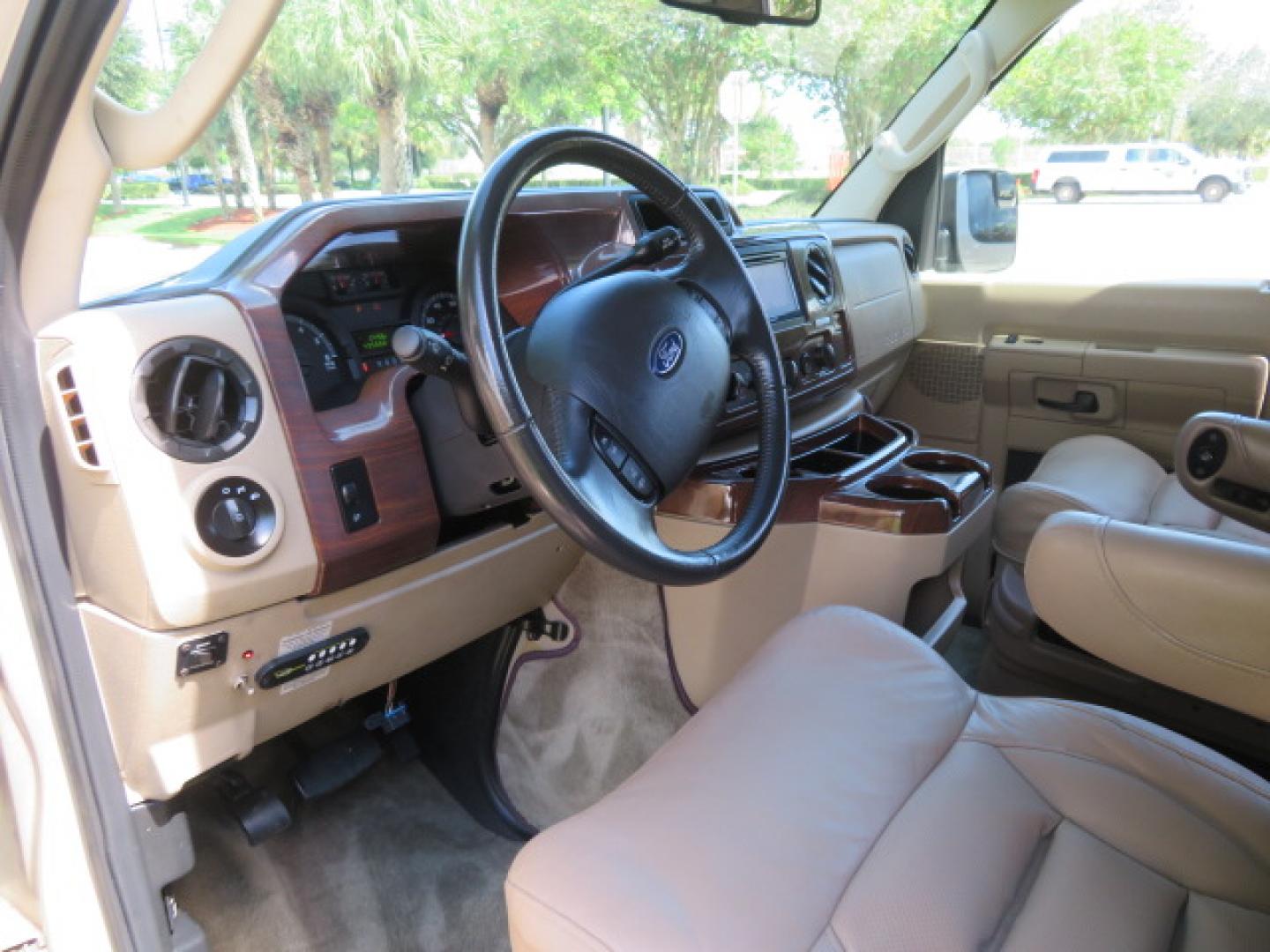 2013 Gold /Beige Ford E-Series Van E-150 (1FDNE1EL2DD) with an 5.4L V8 SOHC 16V FFV engine, 4-Speed Automatic transmission, located at 4301 Oak Circle #19, Boca Raton, FL, 33431, (954) 561-2499, 26.388861, -80.084038 - You are looking at a Gorgeous 2013 Ford Econoline E150 High Top Handicap Wheelchair Conversion Van with 43K Original Miles, Remote Powered Braun UVL Side Entry Wheelchair Lift, Power Side Entry Doors, Expanded Side Entry Doors, Hard Rubber Wheelchair Flooring in the rear of the vehicle, EZ Lock in t - Photo#89