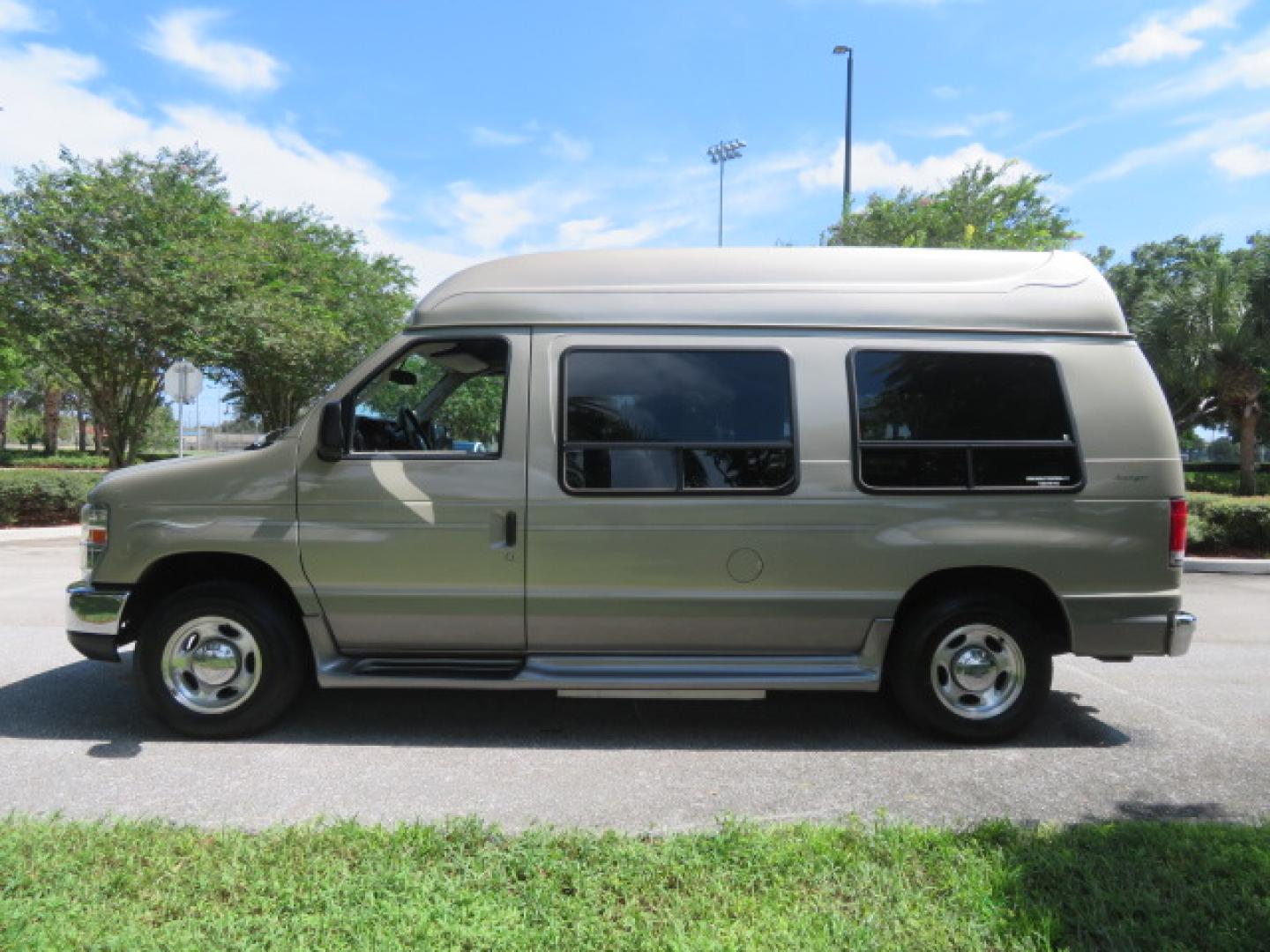 2013 Gold /Beige Ford E-Series Van E-150 (1FDNE1EL2DD) with an 5.4L V8 SOHC 16V FFV engine, 4-Speed Automatic transmission, located at 4301 Oak Circle #19, Boca Raton, FL, 33431, (954) 561-2499, 26.388861, -80.084038 - You are looking at a Gorgeous 2013 Ford Econoline E150 High Top Handicap Wheelchair Conversion Van with 43K Original Miles, Remote Powered Braun UVL Side Entry Wheelchair Lift, Power Side Entry Doors, Expanded Side Entry Doors, Hard Rubber Wheelchair Flooring in the rear of the vehicle, EZ Lock in t - Photo#12